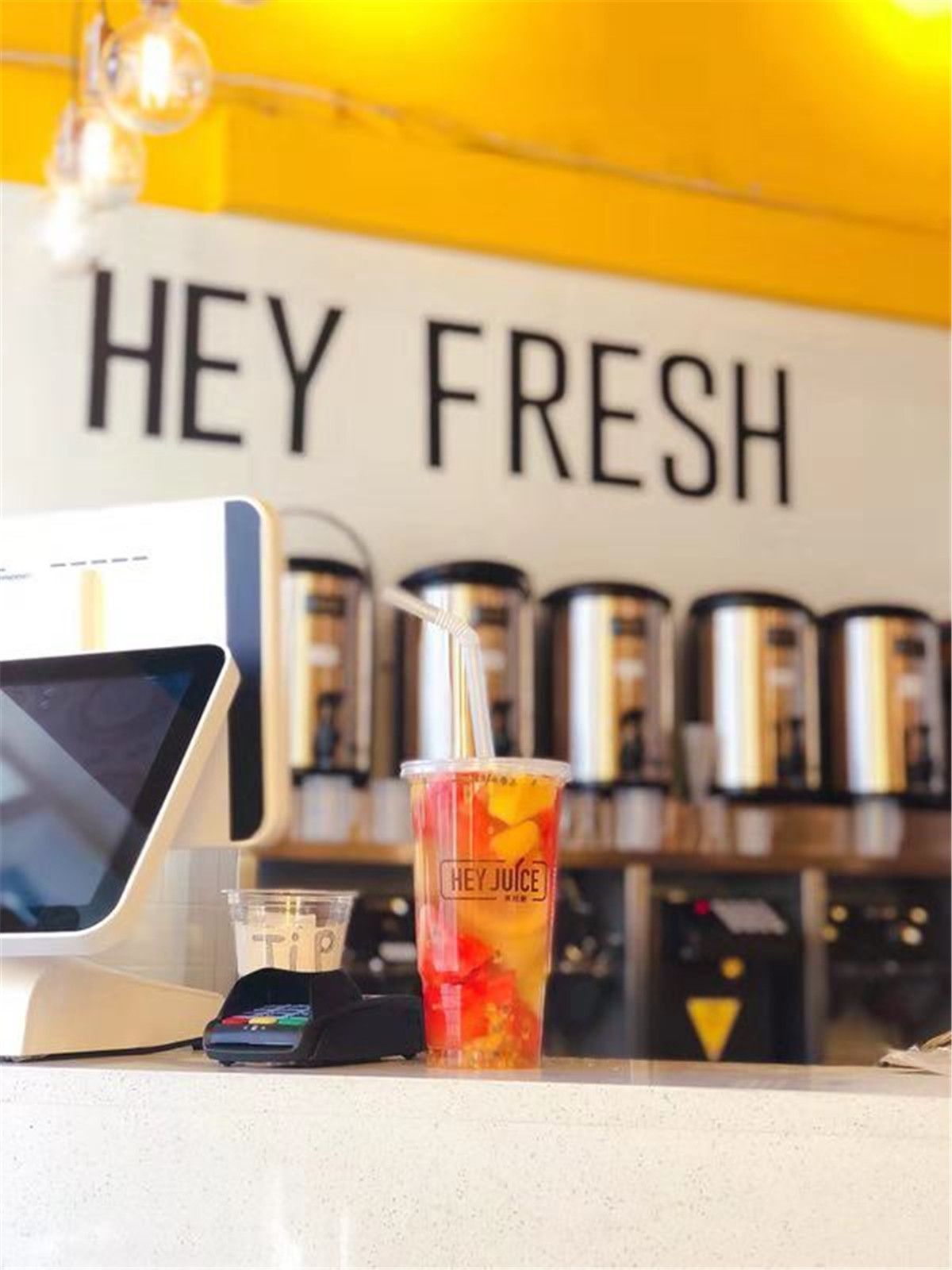 Overall interior view of the HEY FruitTea commercial space after renovation, showcasing an optimized layout designed for customer flow and daily operations.