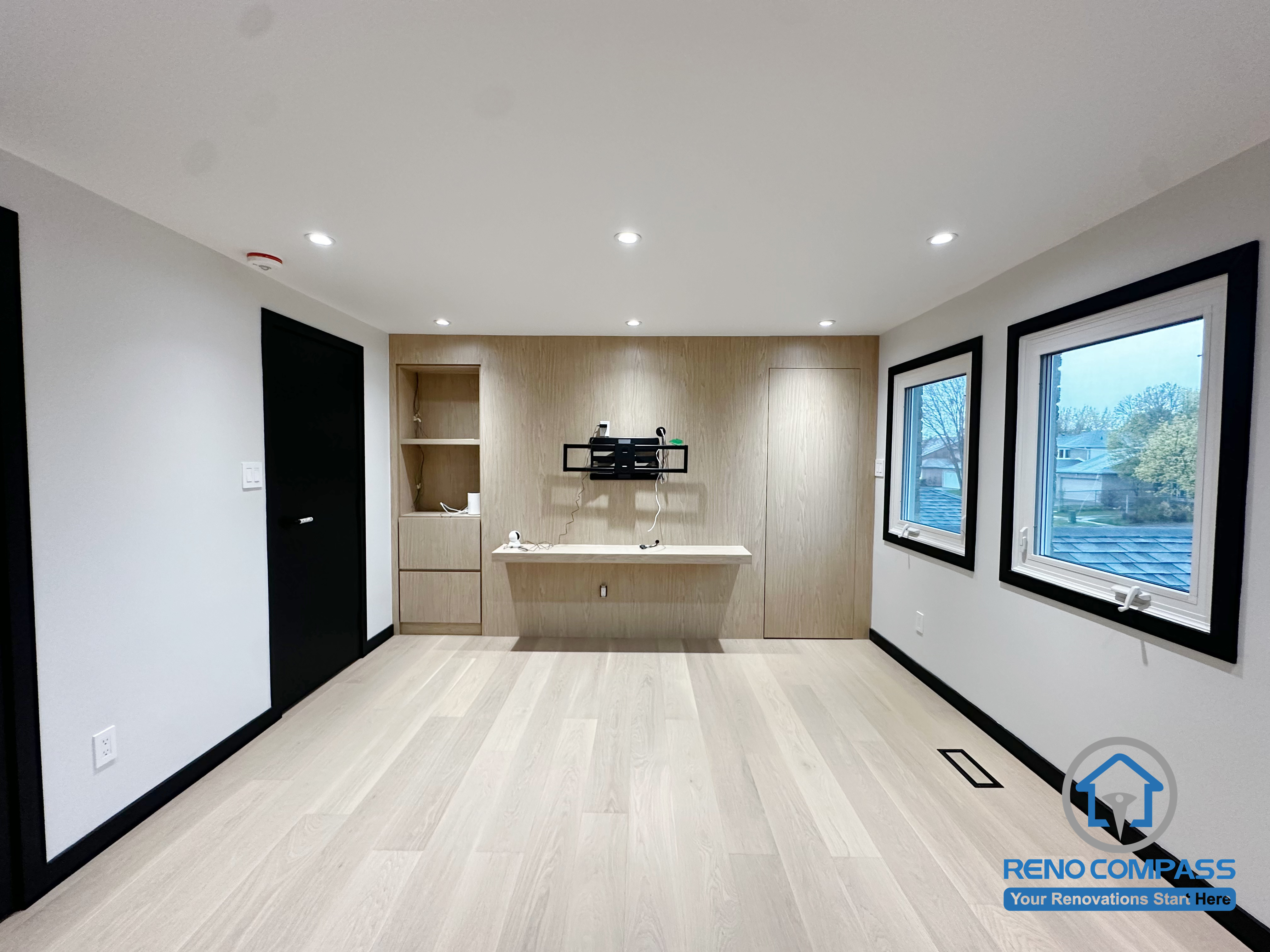 This bedroom in Richmond Hill has been fully renovated with a clean and modern design.
The space features light wood flooring, a custom built-in wall unit, and soft grey accent walls that create a warm and contemporary atmosphere. Large dual-frame windows bring in natural light while improving insulation and energy efficiency.

This room is ideal as a primary bedroom, kids’ room, or multifunctional space, offering both comfort and practicality.
Key upgrades include:

Modern minimalist design

New light-tone engineered flooring

Custom built-in cabinet with TV mount

Upgraded lighting throughout

Richmond Hill bedroom renovation project

—