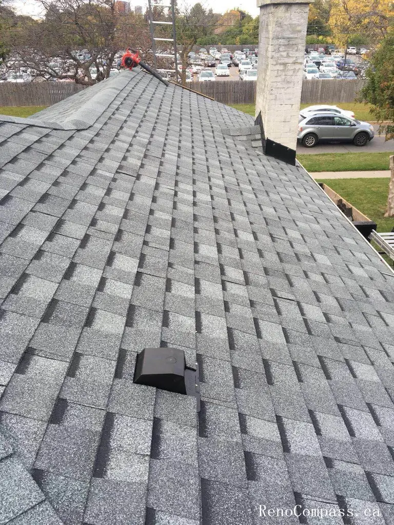 This image highlights a completed roofing replacement project in Toronto, featuring newly installed asphalt shingles designed for durability and long-term weather protection. The roofing system includes properly aligned shingle installation and upgraded roof ventilation units to improve airflow and prevent moisture buildup. Careful attention was given to roof slope consistency, flashing details, and overall finishing to ensure reliable performance through Toronto’s harsh winters and seasonal changes. Completed by an experienced Toronto roofing and renovation team, the project enhances both structural protection and the home’s exterior appearance while maintaining high installation standards.