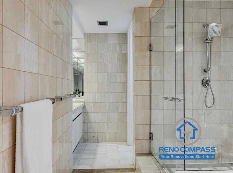 This Toronto bathroom shower area before renovation includes classic tile walls and older fixtures. The space was ready for a modern upgrade with improved waterproofing, lighting, and contemporary finishes.