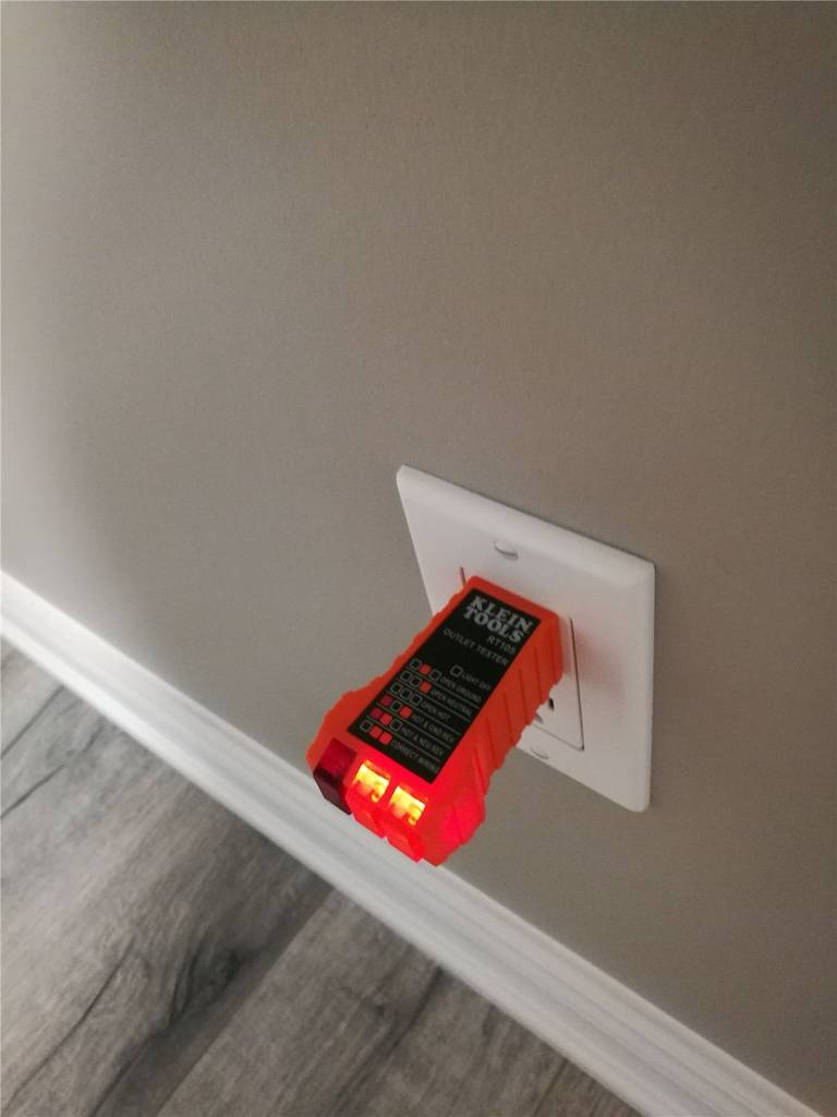 As part of this Markham basement renovation, electrical outlets were professionally installed and tested to ensure safety, reliability, and code compliance. This image highlights a completed power outlet inspection using a circuit tester, confirming proper wiring and functionality for the newly finished basement space. Careful attention to electrical details enhances everyday convenience while supporting modern lighting, entertainment systems, and appliances. A well-executed electrical upgrade is essential to any high-quality basement renovation, delivering both peace of mind and long-term performance for homeowners in Markham.