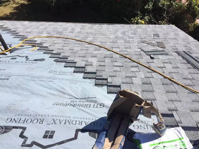 Professional Toronto roofing team performing shingle roof replacement on a residential property. This project showcases high-quality asphalt shingle installation, proper safety procedures, and detailed roof work in the Greater Toronto Area. Completed by experienced roofing contractors ensuring durability, weather resistance, and long-term protection for the home.