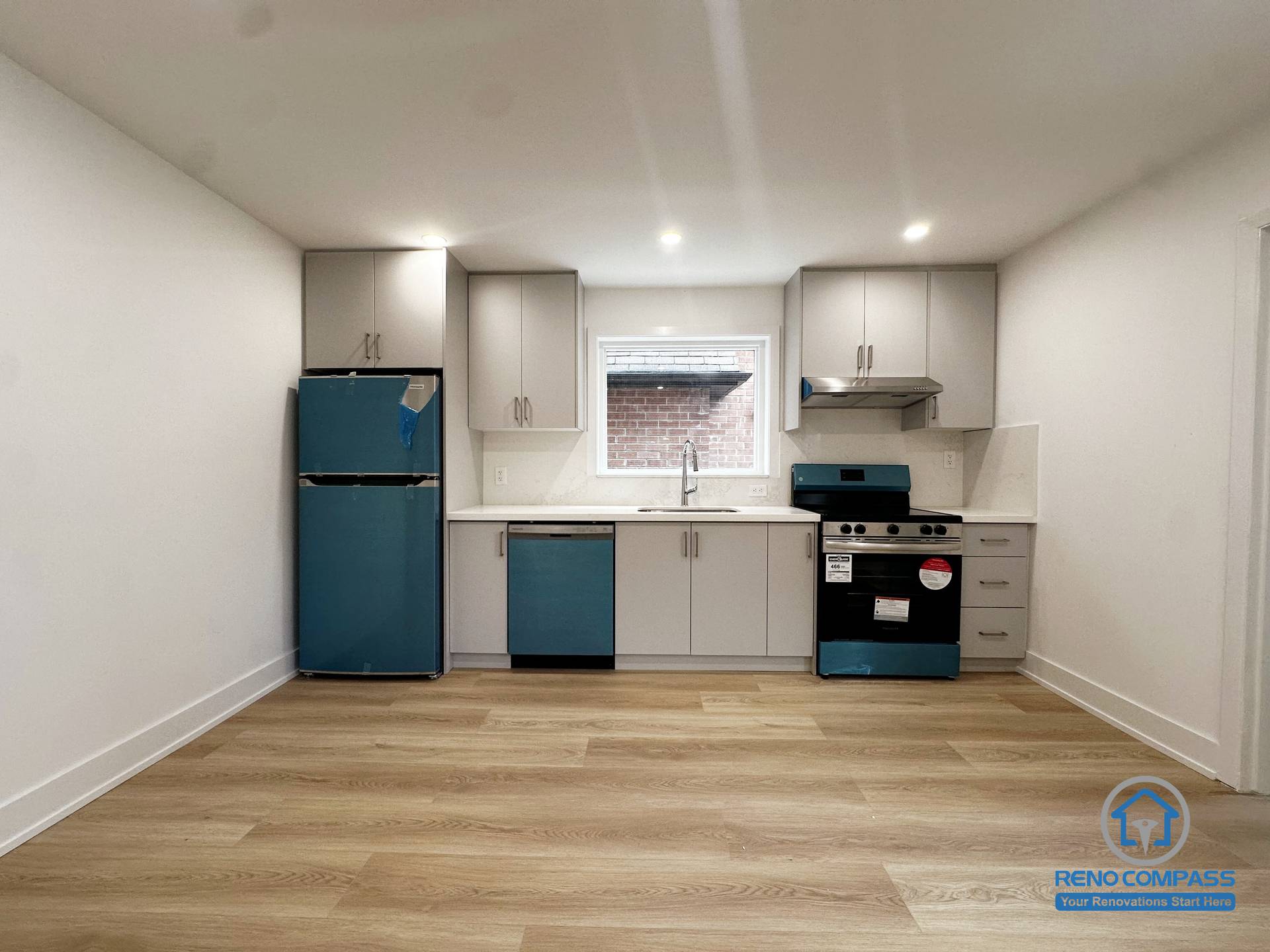 This basement unit features a full kitchen and open living area with modern finishes. As part of a Toronto legal 3-unit conversion, the layout supports independent living and enhances the rental functionality of the space.