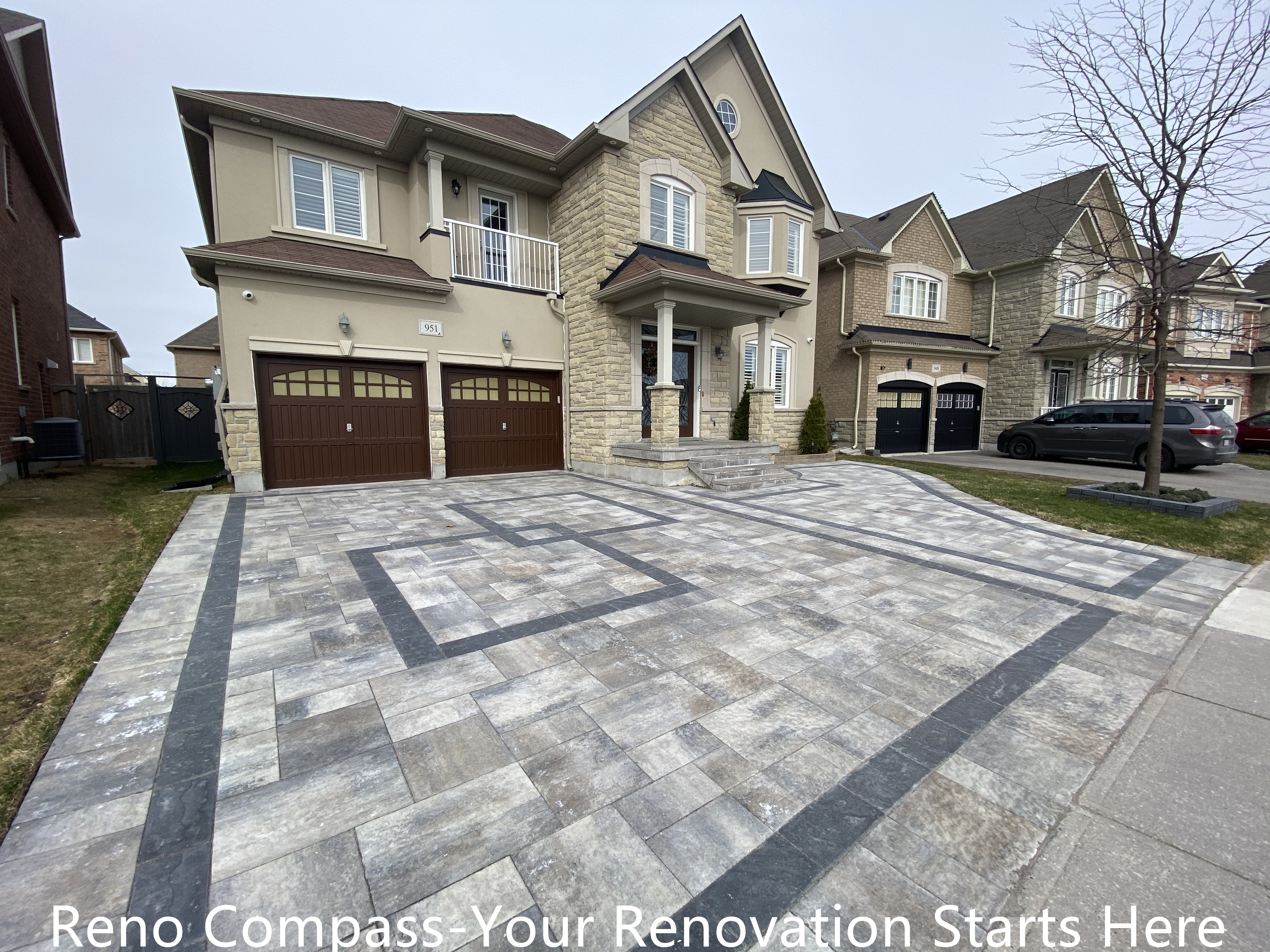 Front yard interlocking driveway renovation in Newmarket featuring large-format concrete pavers with geometric patterns and clean border detailing. The upgraded driveway enhances curb appeal, improves drainage performance, and creates a durable, low-maintenance outdoor surface. Designed and completed by a professional Toronto renovation company with a focus on long-lasting materials and precise installation.