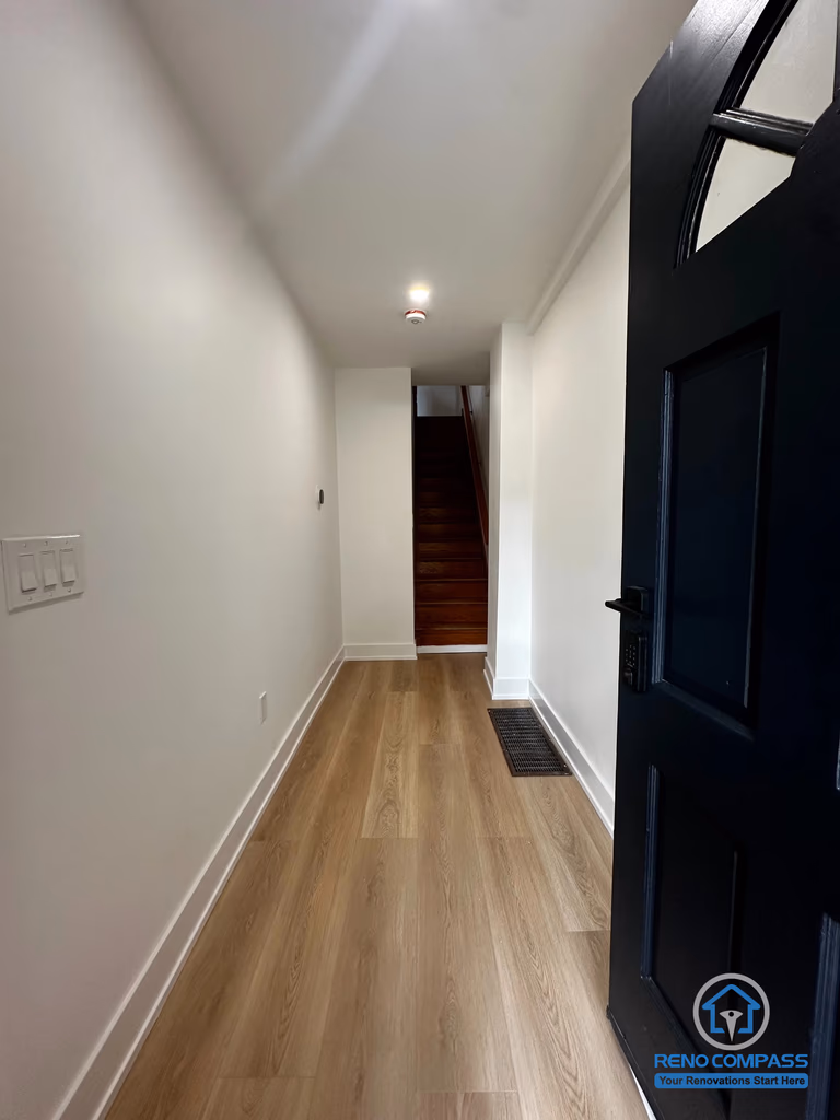This hallway leads to the second-floor unit in a Toronto legal 3-unit conversion project. The layout ensures clear separation between units while maintaining efficient circulation, supporting independent access and improved tenant privacy.