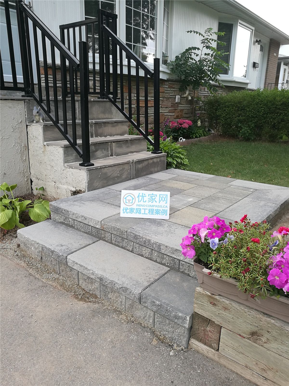 Front entrance interlock steps and walkway renovation for a residential property in Vaughan. Completed by a trusted Toronto renovation company, Reno Compass Inc., this project improves safety, curb appeal, and durability through professionally installed interlock stone and exterior landscaping details.