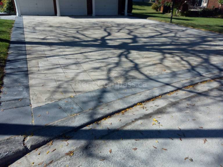 A stunning custom interlocking driveway designed and installed in Aurora by Reno Compass. Featuring precision stone alignment, clean edges, and a durable surface that enhances both function and curb appeal. Perfect for luxury homes and modern landscaping projects in the Greater Toronto Area.