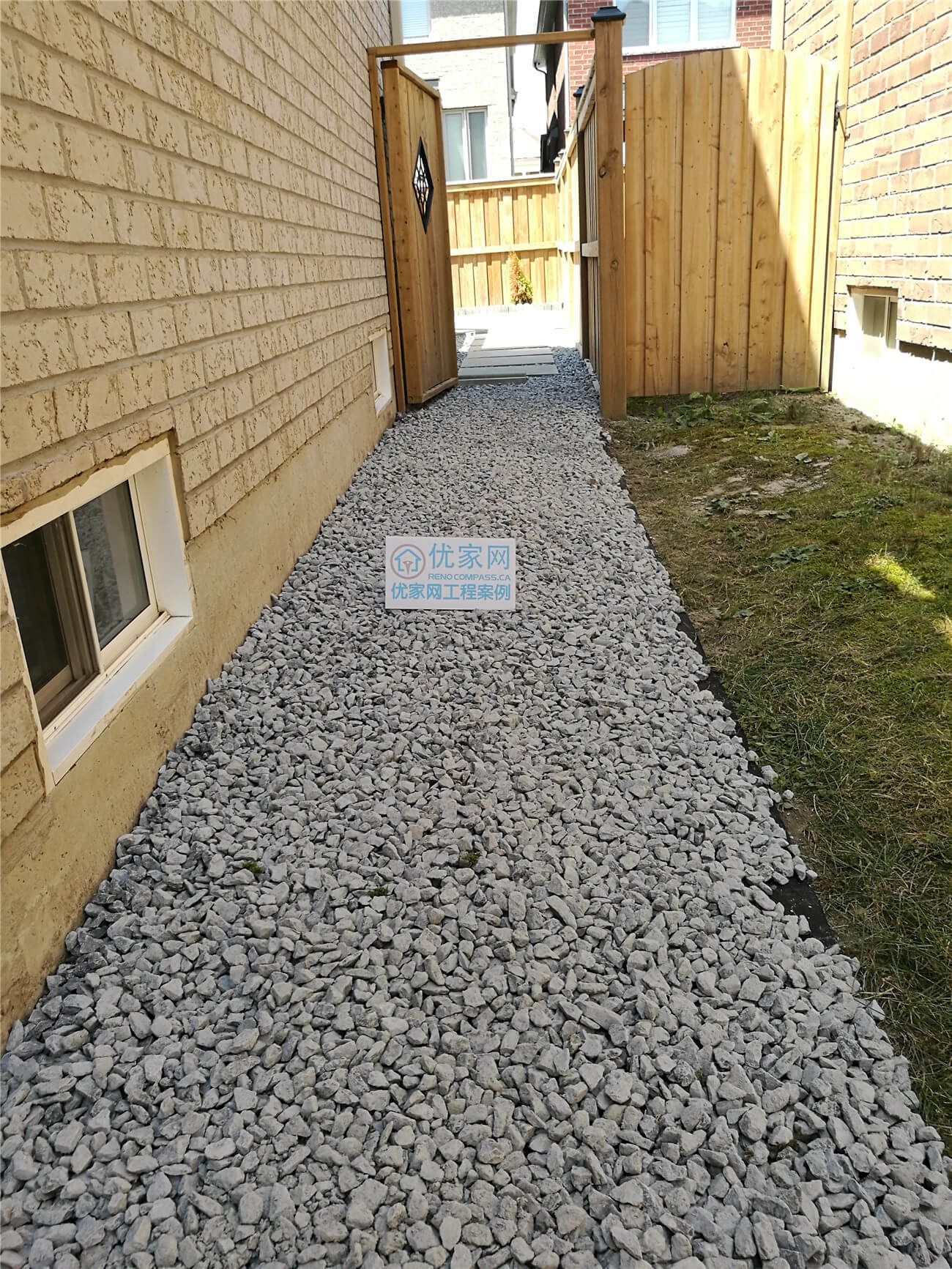 This Stouffville residential landscaping renovation showcases the use of gravel foundation and concrete paver elements to enhance outdoor pathways. The construction improves water drainage and provides a solid walking surface, making the space more practical for daily use while maintaining a simple and modern exterior aesthetic.