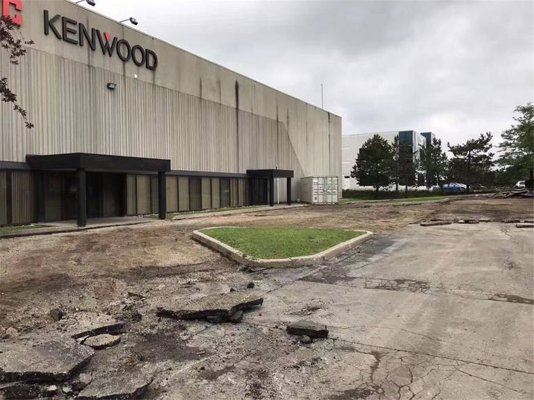 This Markham commercial landscaping renovation project begins with site preparation and the removal of old asphalt paving around the building exterior. The work includes clearing damaged pavement and preparing the ground for new landscaping and pavement installation. Completed by an experienced Toronto Renovation Company, the project focuses on improving site infrastructure, safety, and overall property appearance.