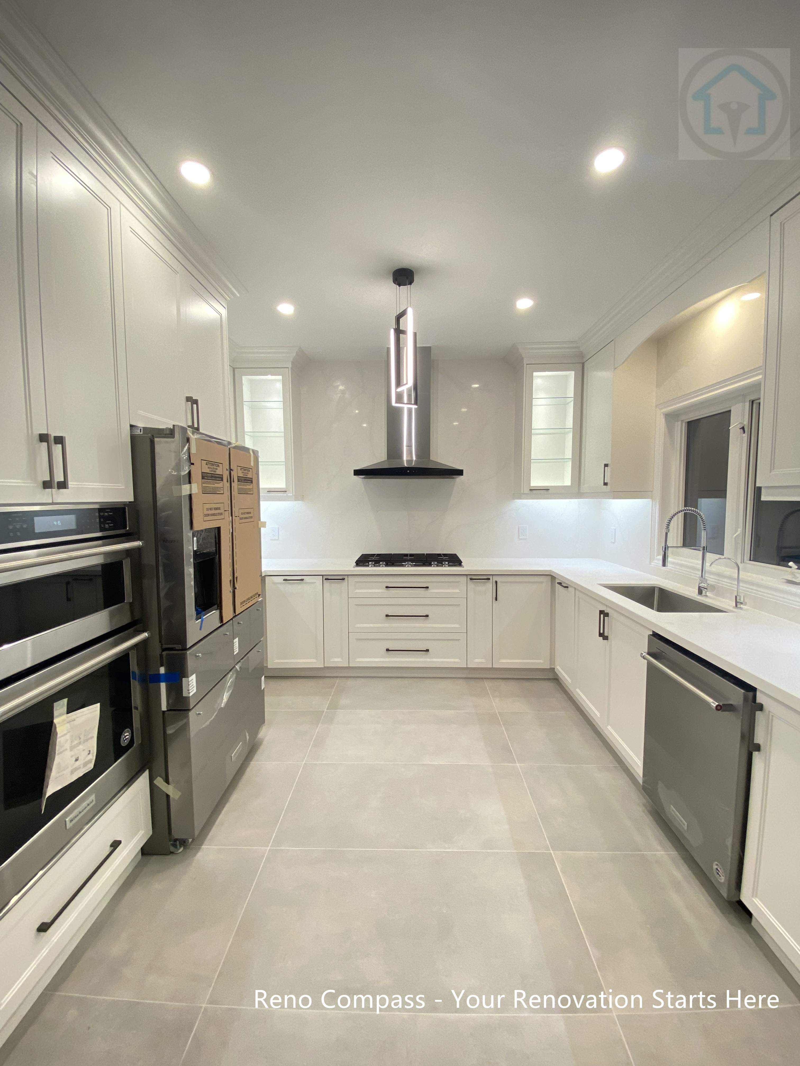 Contemporary kitchen renovation in Oakville with cohesive finishes, clean cabinet lines, and a well-balanced layout designed to enhance usability, organization, and overall kitchen comfort.