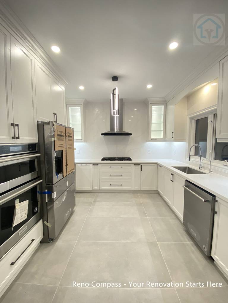 Contemporary kitchen renovation in Oakville with cohesive finishes, clean cabinet lines, and a well-balanced layout designed to enhance usability, organization, and overall kitchen comfort.