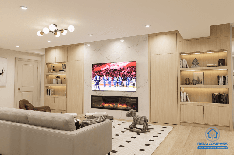 Modern basement renovation in Newmarket featuring a custom TV wall with fireplace and built-in cabinetry. Clean, warm design ideal for family living space.