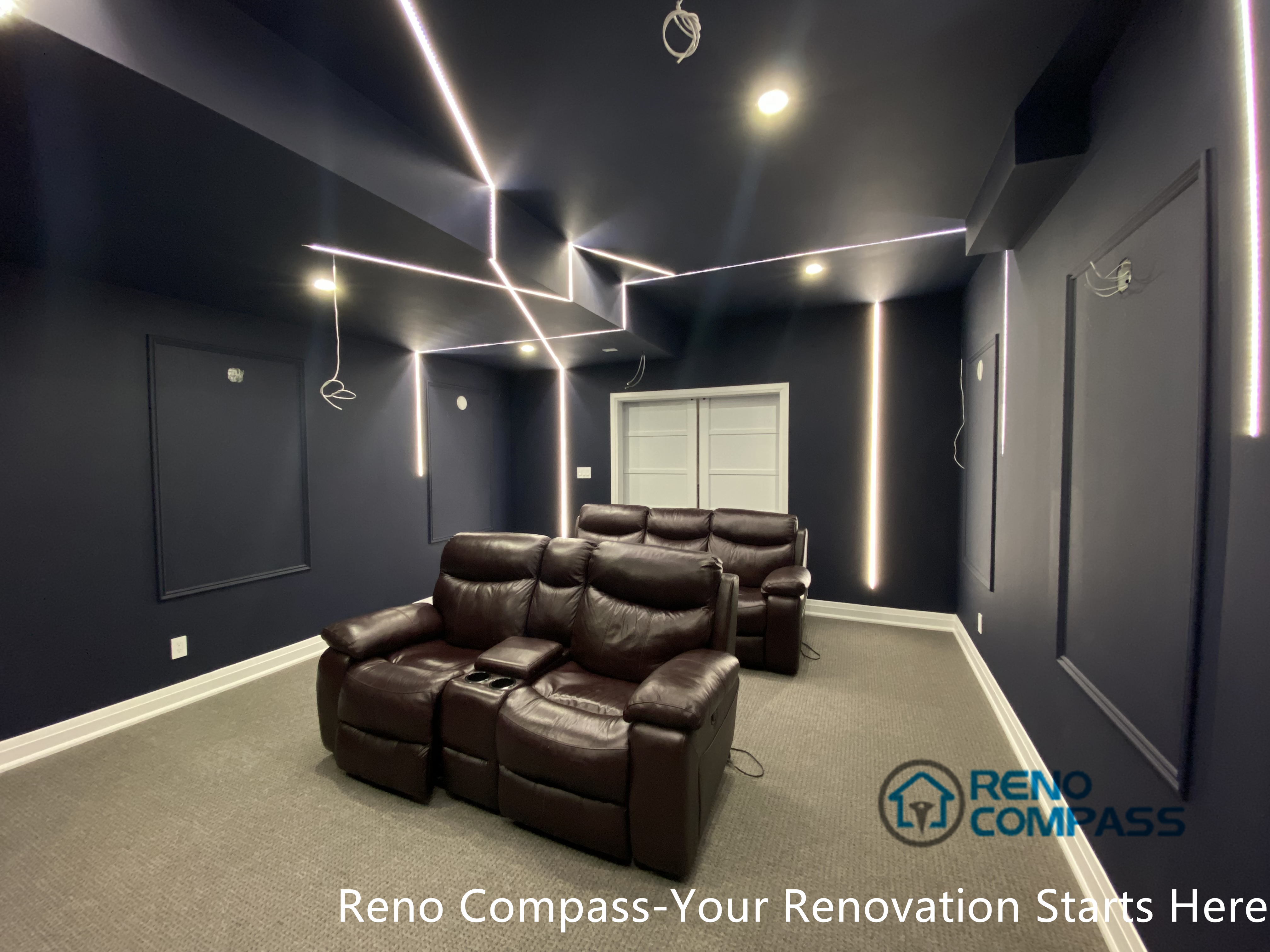 This Newmarket basement home theater renovation features a modern dark-tone design with custom recessed LED ceiling lighting, acoustic wall panels, and a dedicated media seating layout. Designed and built by an experienced Toronto renovation company, this basement transformation delivers a cinematic atmosphere while maintaining comfort, clean lines, and functional lighting control—ideal for family entertainment and private movie nights.