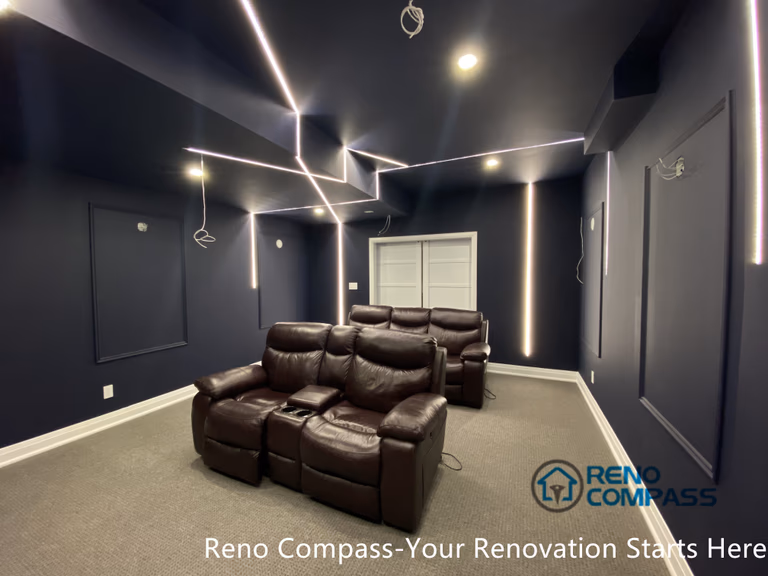 This Newmarket basement home theater renovation features a modern dark-tone design with custom recessed LED ceiling lighting, acoustic wall panels, and a dedicated media seating layout. Designed and built by an experienced Toronto renovation company, this basement transformation delivers a cinematic atmosphere while maintaining comfort, clean lines, and functional lighting control—ideal for family entertainment and private movie nights.