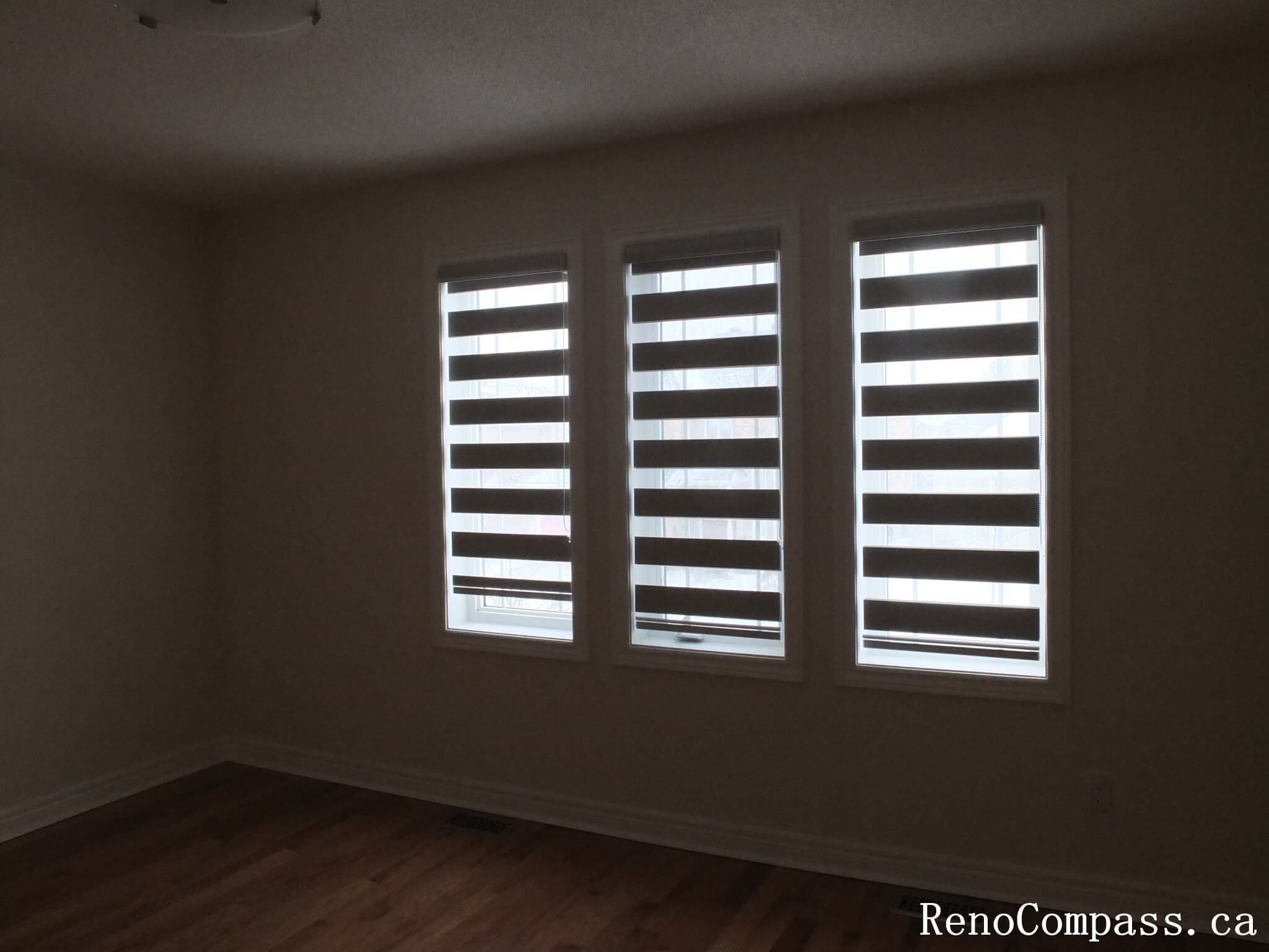 Custom zebra blinds curtains installation completed in Richmond Hill, featuring modern dual-layer window shades that provide privacy, light control, and a clean contemporary look. This professional window treatment upgrade enhances interior comfort and style, perfectly suited for modern home renovations by a trusted Toronto renovation company.