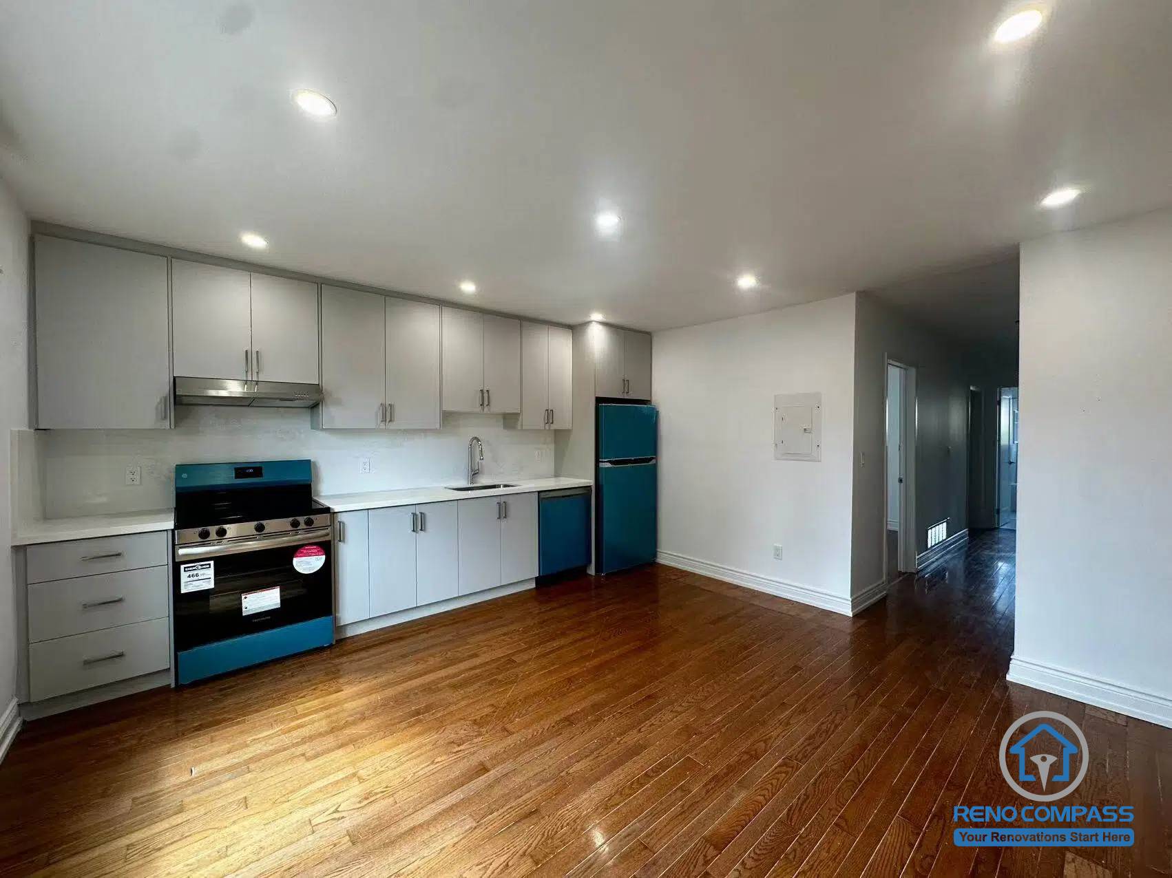 This main floor unit features an open-concept kitchen and spacious living area with hardwood flooring and modern finishes. As part of a Toronto legal 3-unit conversion, the layout is designed for comfortable independent living and strong rental appeal.