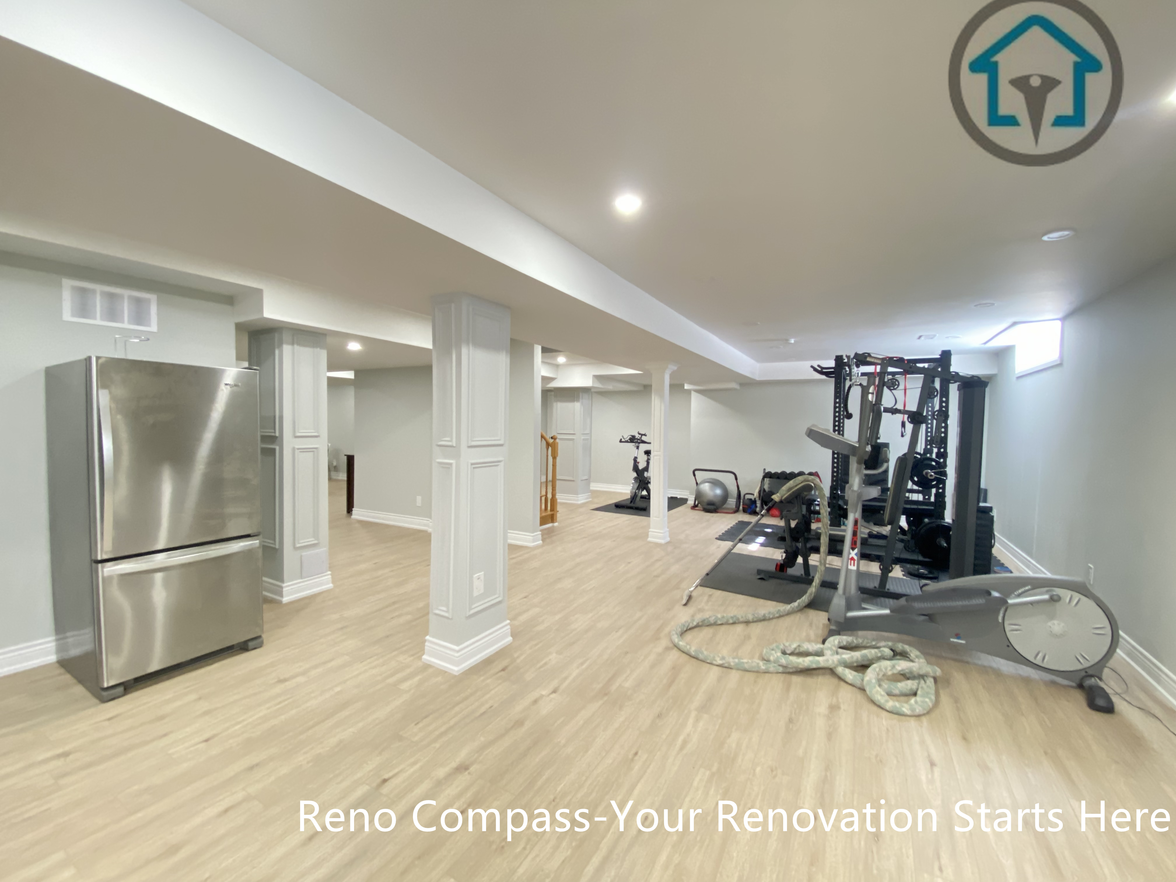 An open-concept basement renovation in Stouffville featuring a custom home gym and flexible multipurpose layout. This project by Reno Compass focuses on durable flooring, structural column detailing, recessed lighting, and efficient space planning to support daily fitness and family use. Designed for homeowners in Stouffville and the Greater Toronto Area seeking practical and well-executed basement renovation solutions.