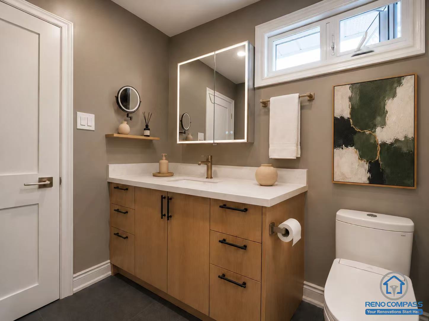 Custom bathroom vanity featuring a quartz countertop, integrated LED medicine cabinet, warm wood cabinetry, matte black hardware, and modern bathroom styling by Reno Compass in Toronto.