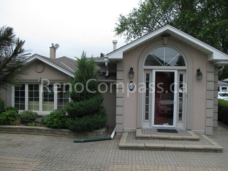 This image shows the exterior of a detached house undergoing a roofing renovation project in Vaughan, Greater Toronto Area. The roofing upgrade is designed to improve durability, weather resistance, and overall curb appeal. Completed by a professional Toronto Renovation Company, this roof renovation enhances both the protection and long-term value of the home.