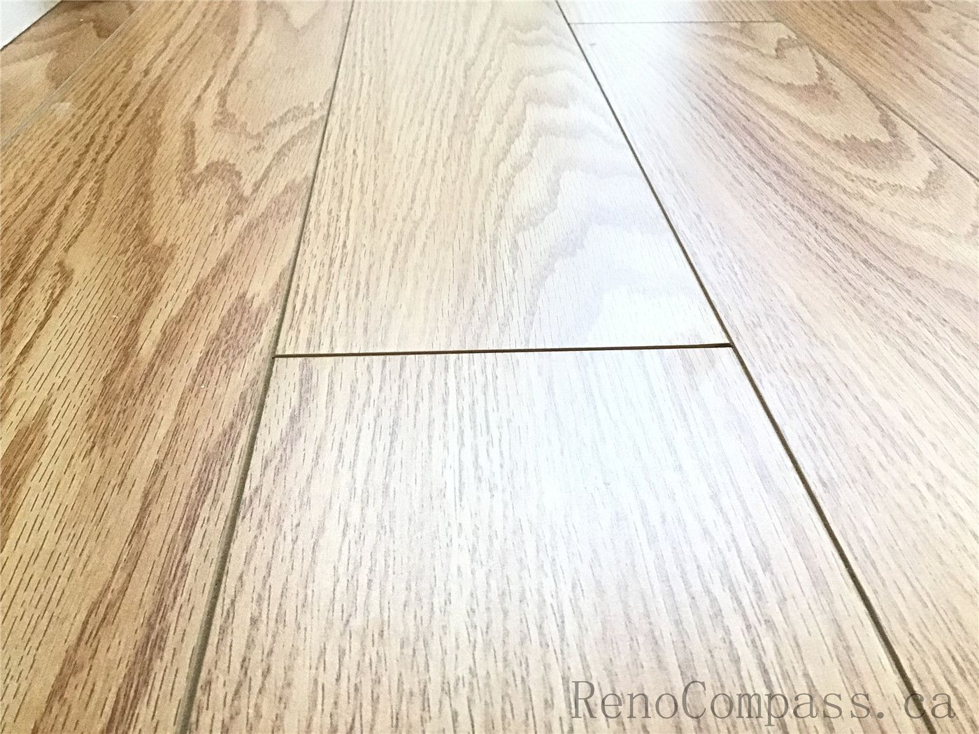 This close-up image showcases the fine craftsmanship of hardwood flooring installation in Oakville. The natural wood grain patterns, smooth surface finish, and precise plank alignment highlight the quality of materials and attention to detail, delivering a durable and visually refined flooring solution.