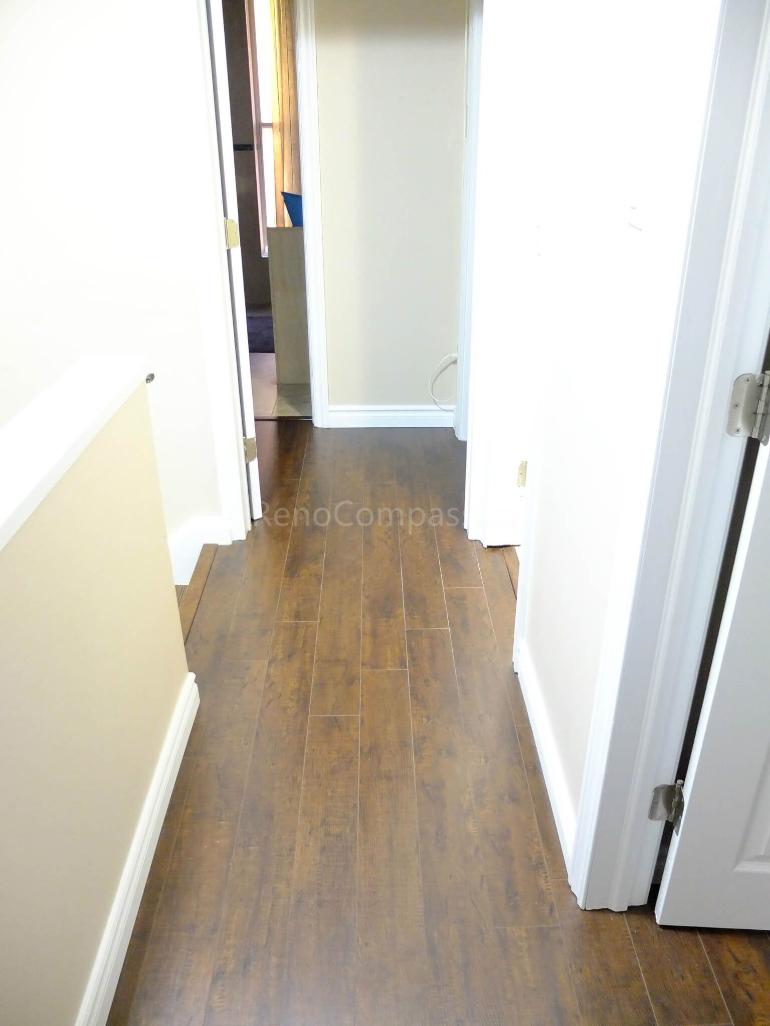 This North York interior renovation features upgraded wood flooring and a modern staircase design that enhances both safety and visual appeal. Completed by a professional Toronto renovation company, the project focuses on durable materials, clean finishing details, and a cohesive layout to create a warm and modern living space.