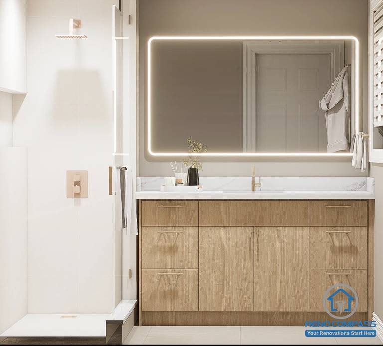 This modern bathroom was renovated as part of a whole house renovation in North York. Featuring a custom oak vanity, quartz countertop, oversized LED mirror, and clean contemporary finishes, the space is designed to maximize brightness, functionality, and everyday comfort while maintaining a timeless aesthetic.