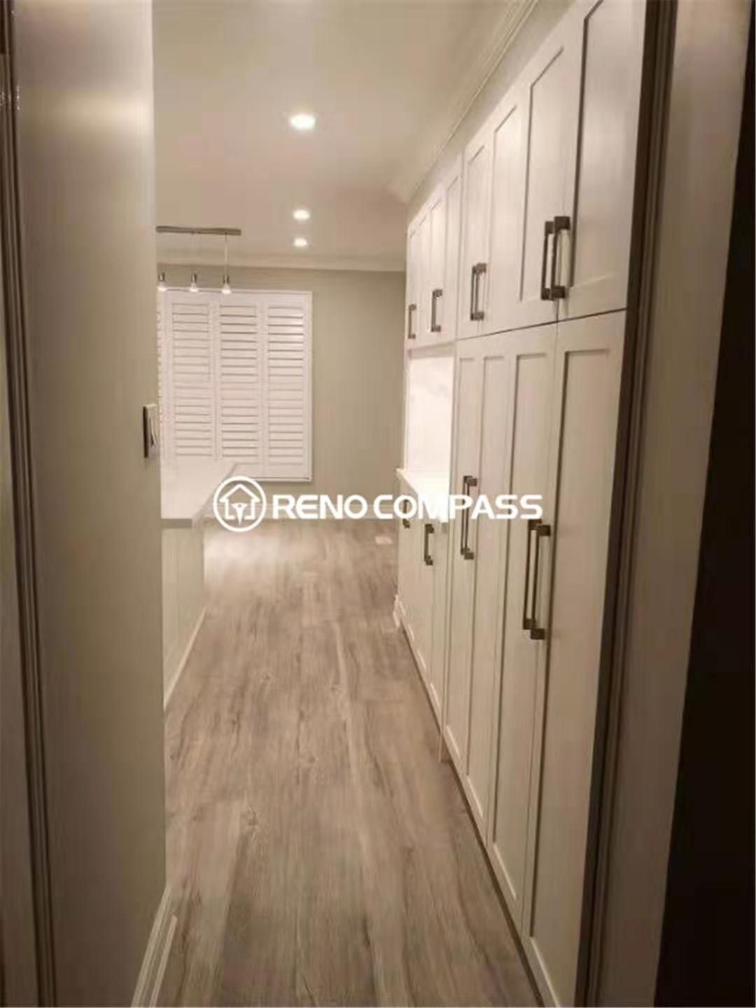 This Mississauga kitchen renovation showcases a custom-built storage and pantry cabinet wall designed to maximize organization and functionality. Completed by a trusted Toronto renovation company, the project features full-height shaker cabinets, modern hardware, upgraded flooring, and recessed lighting to create a clean and seamless transition between kitchen and dining areas. The redesigned layout improves daily usability while offering ample storage for a clutter-free space. Elegant finishes and durable materials ensure the kitchen remains both stylish and practical for long-term family living.