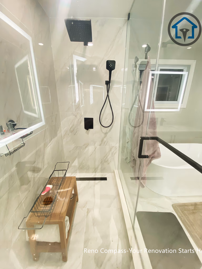 Interior view of the walk-in shower featuring Olympia Tile, light neutral finishes, and a clean, open layout that enhances brightness and comfort.