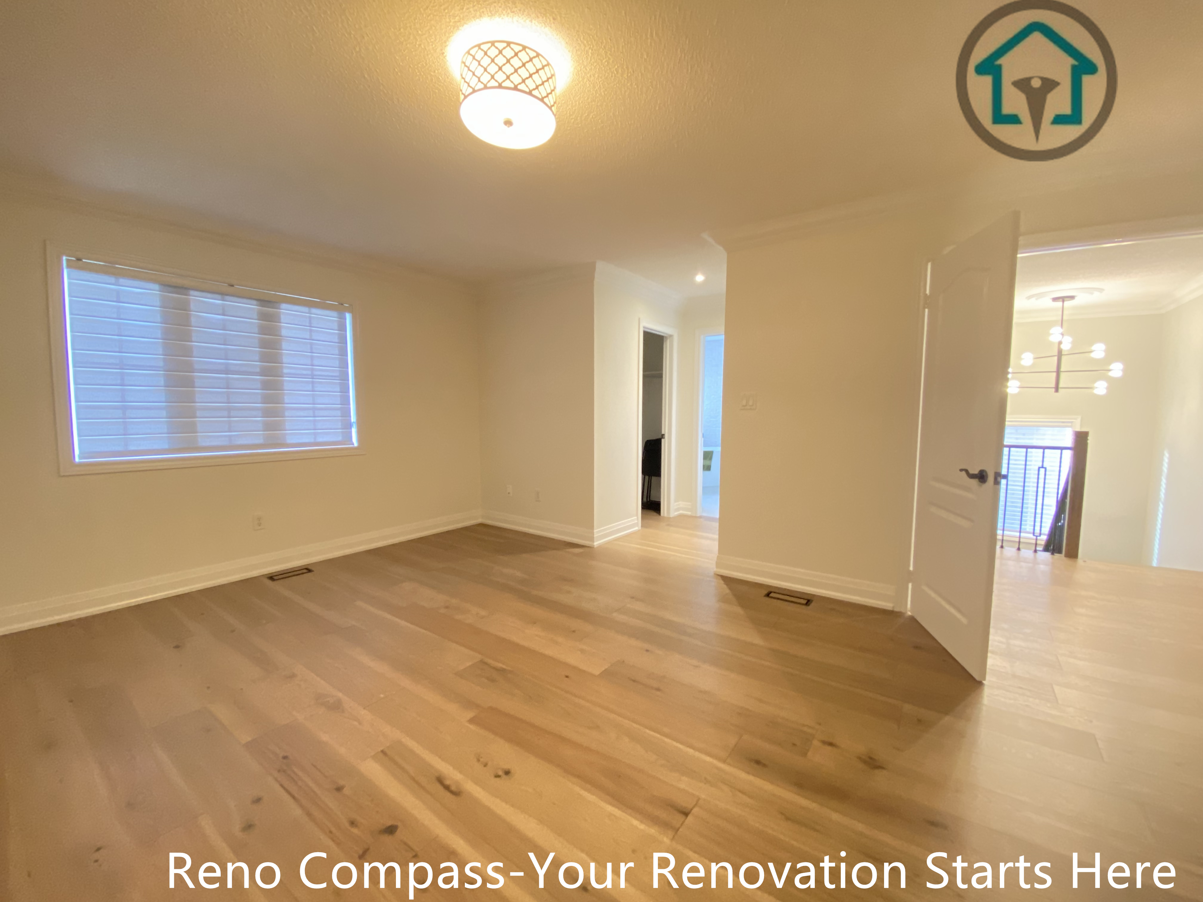 This image features a newly renovated bedroom as part of a flooring and interior renovation project in Richmond Hill. The space is finished with wide-plank hardwood flooring, soft neutral wall colors, and clean white trim, creating a bright and welcoming atmosphere. Updated lighting and smooth floor transitions enhance both comfort and functionality. Completed by a trusted Toronto renovation company, this renovation focuses on durability, clean craftsmanship, and a timeless design suitable for everyday residential use.