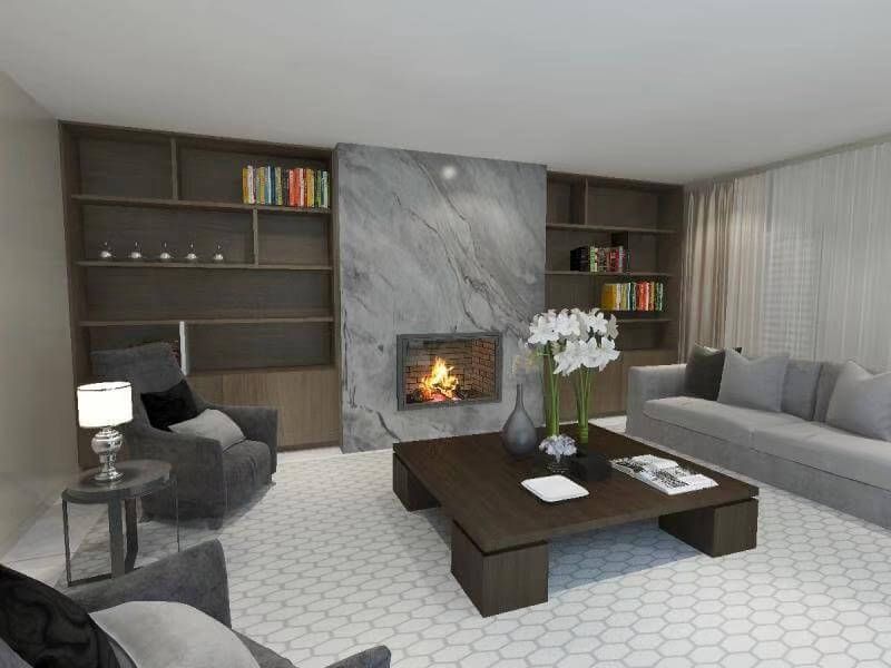 This Toronto interior design project showcases a sophisticated living room featuring a custom marble fireplace feature wall with integrated built-in shelving. The floor-to-ceiling cabinetry enhances storage while maintaining a clean, symmetrical layout. Warm fireplace lighting contrasts beautifully with the neutral-toned furniture and textured area rug, creating a refined yet inviting atmosphere. Designed and executed by Reno Compass Inc., this project reflects modern elegance, functional design, and high-end interior detailing.