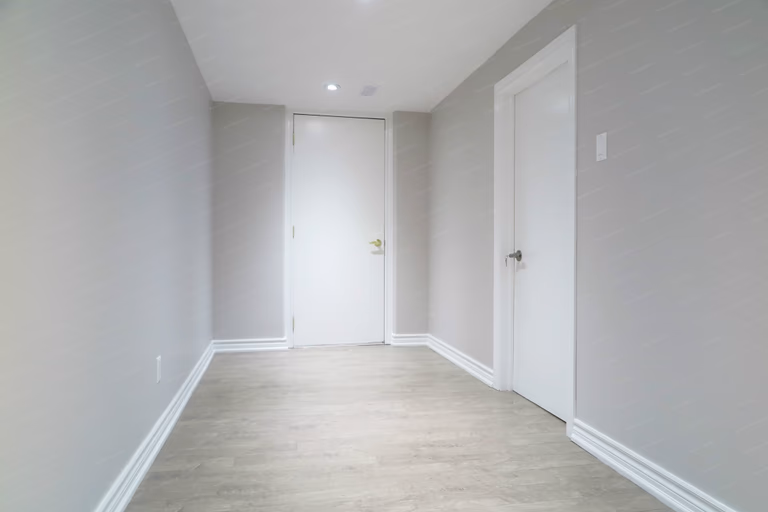 Detailed ceiling and wall junctions demonstrate high-quality workmanship in this Richmond Hill basement renovation, delivering a clean and cohesive finish.