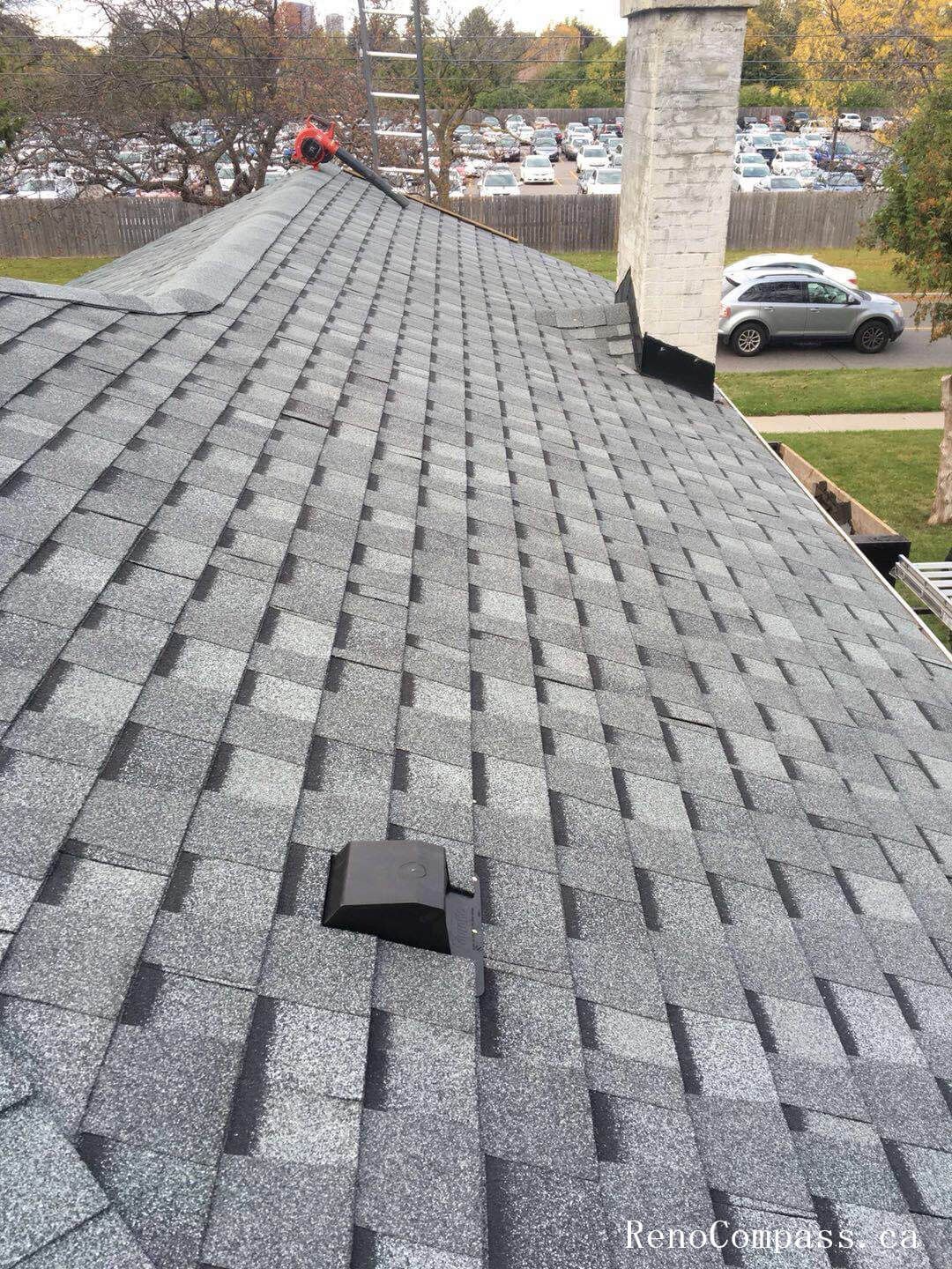 This image showcases the completed stage of a residential roofing replacement project in Toronto, featuring newly installed asphalt shingles with clean alignment and consistent finishing. The roofing system has been carefully installed to ensure proper ventilation, waterproof protection, and long-term durability against Toronto’s seasonal weather conditions. Attention to detail in shingle layout, ridge finishing, and overall roof slope enhances both structural performance and exterior curb appeal. Completed by a professional Toronto roofing and renovation team, this new roof installation provides improved energy efficiency, reliable protection, and a refreshed exterior look for the home.