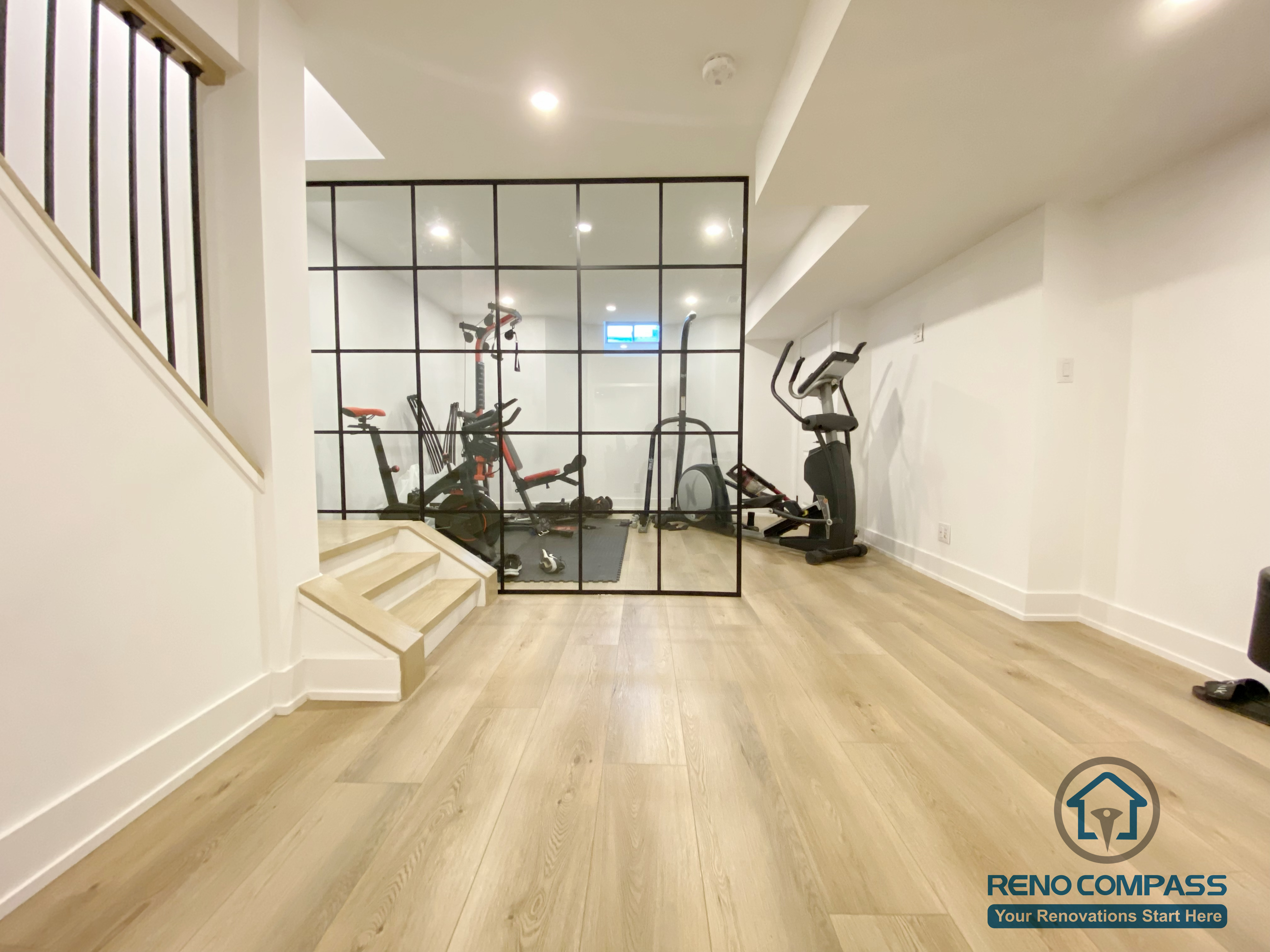 This basement living and activity area is designed with an open-concept layout, maximizing comfort and flexibility. The renovation enhances natural flow and usability while adding valuable living space to the Markham home.