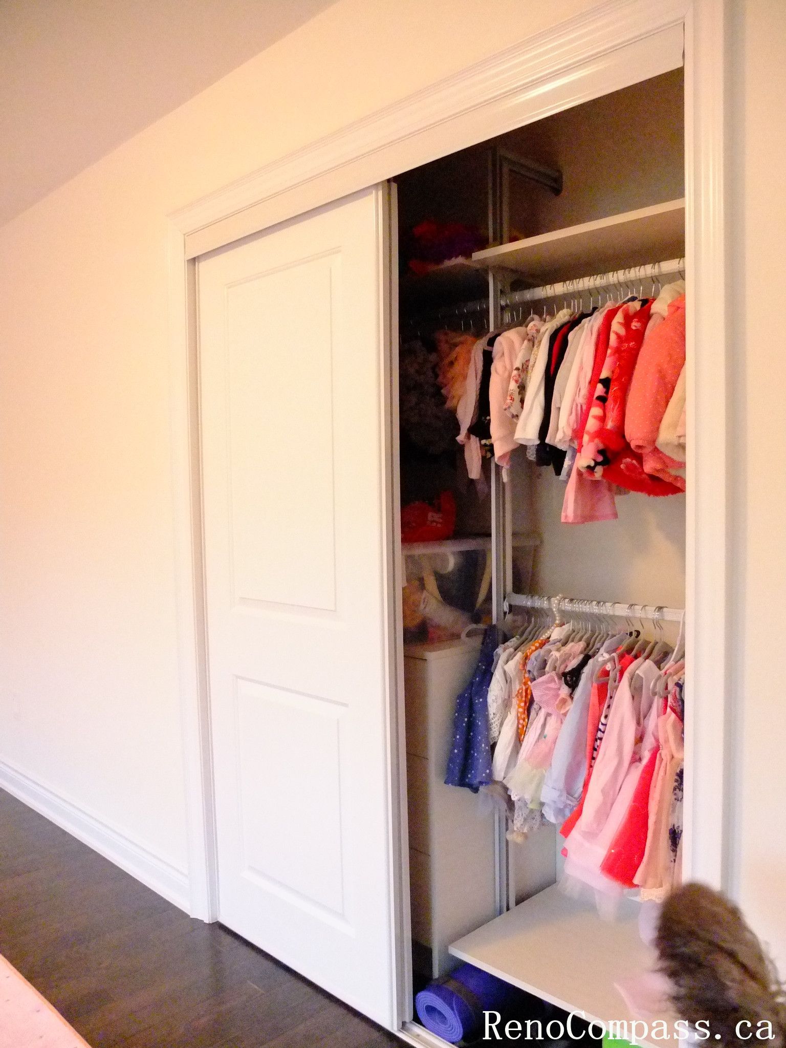 This Toronto closet cabinet upgrade features a clean sliding door system with a functional built-in drawer unit and hanging space. The design maximizes storage efficiency while keeping a modern and minimal look, perfect for organizing clothes and daily essentials in compact bedrooms.