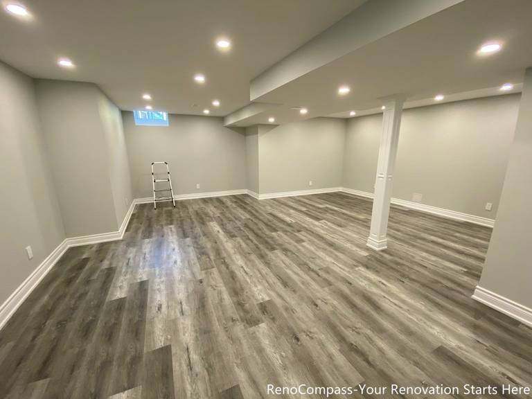 This Richmond Hill basement renovation features a clean modern design with high-quality vinyl flooring, smooth ceiling finishing, and recessed pot lights for a bright and spacious feel. Completed by professional Toronto renovation company Reno Compass Inc., the project transforms the basement into a functional and comfortable living space ideal for family use, rental, or entertainment. The neutral wall tones and durable flooring enhance both aesthetics and long-term value.