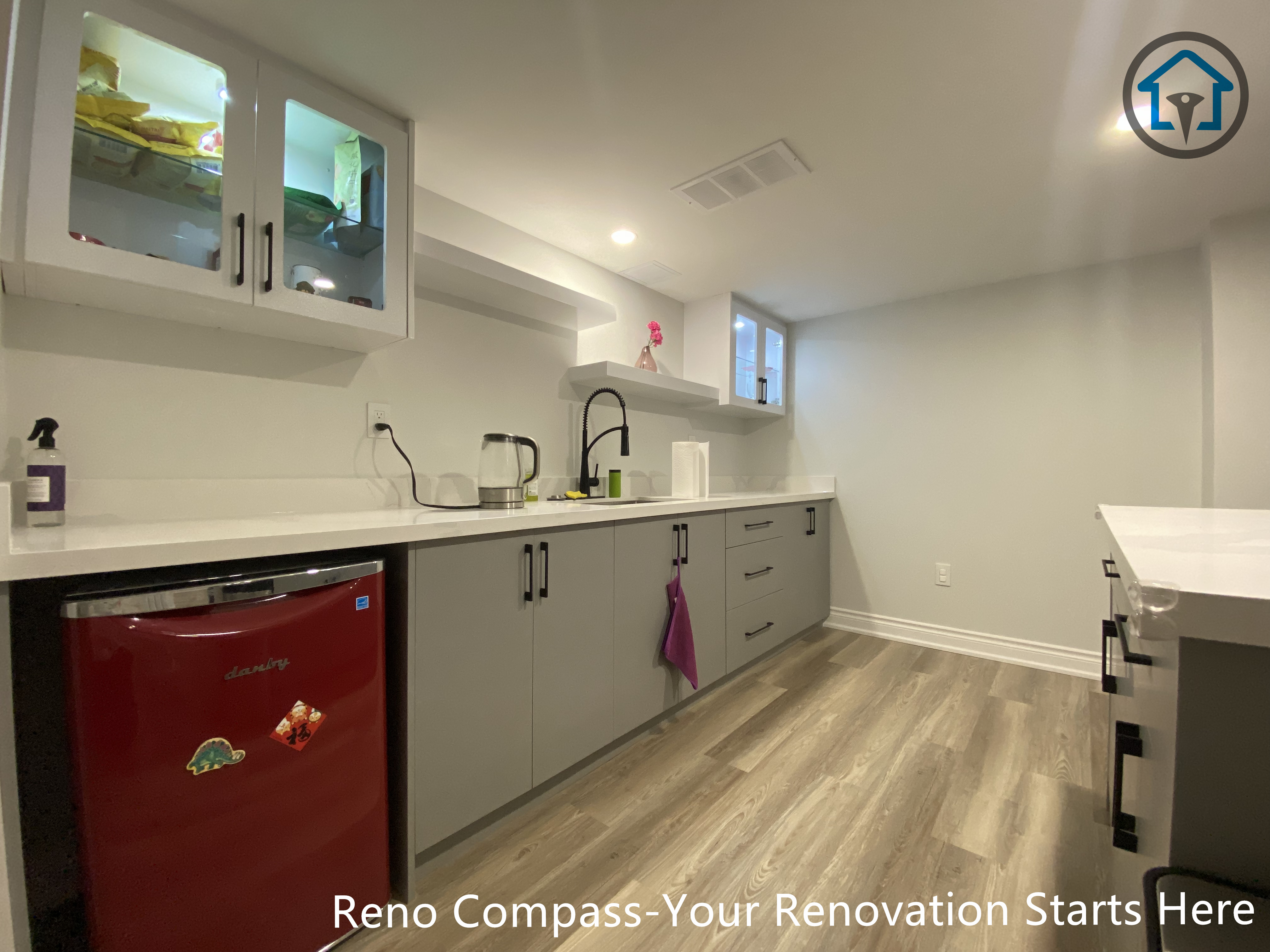 Basement living area renovation in Vaughan featuring clean finishes, neutral tones, and a practical layout for family activities or entertainment.