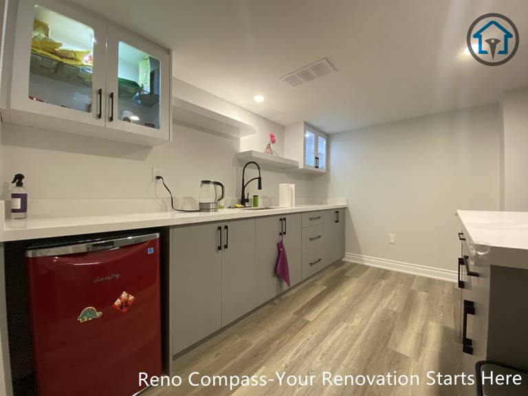 Basement living area renovation in Vaughan featuring clean finishes, neutral tones, and a practical layout for family activities or entertainment.