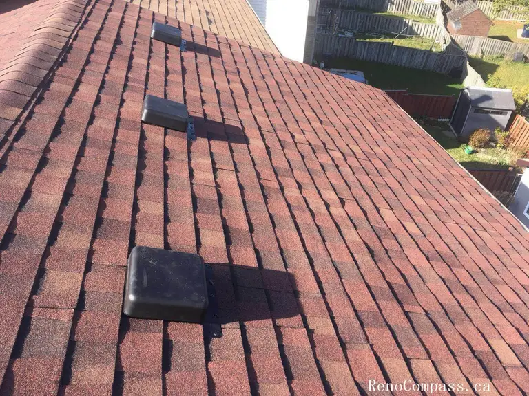 This image highlights a completed roofing replacement project in Toronto, featuring newly installed asphalt shingles designed for durability and long-term weather protection. The roofing system includes properly aligned shingle installation and upgraded roof ventilation units to improve airflow and prevent moisture buildup. Careful attention was given to roof slope consistency, flashing details, and overall finishing to ensure reliable performance through Toronto’s harsh winters and seasonal changes. Completed by an experienced Toronto roofing and renovation team, the project enhances both structural protection and the home’s exterior appearance while maintaining high installation standards.