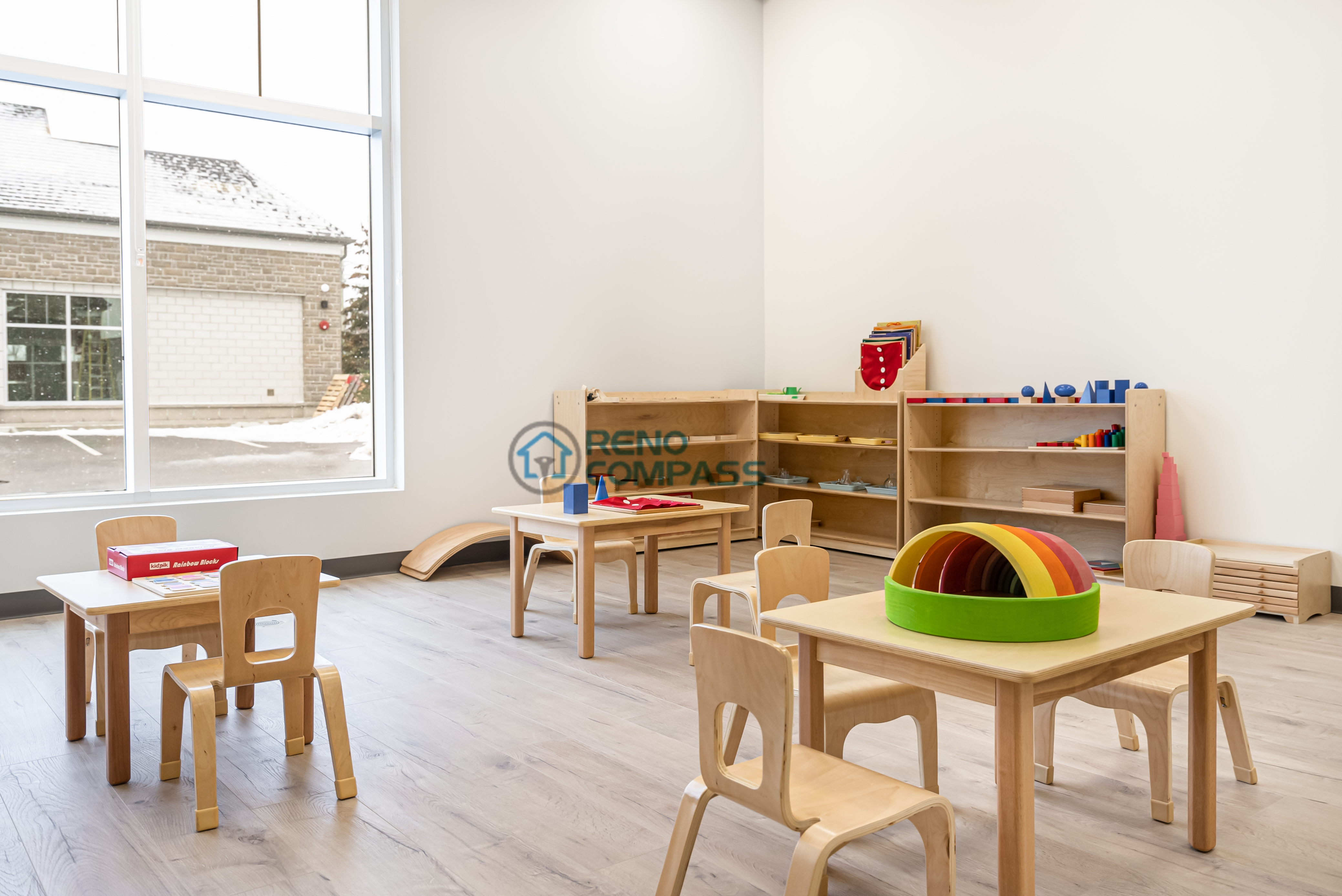 Interior daycare renovation in Richmond Hill showcasing an organized activity zone with clear circulation, child-safe finishes, and flexible space planning.
