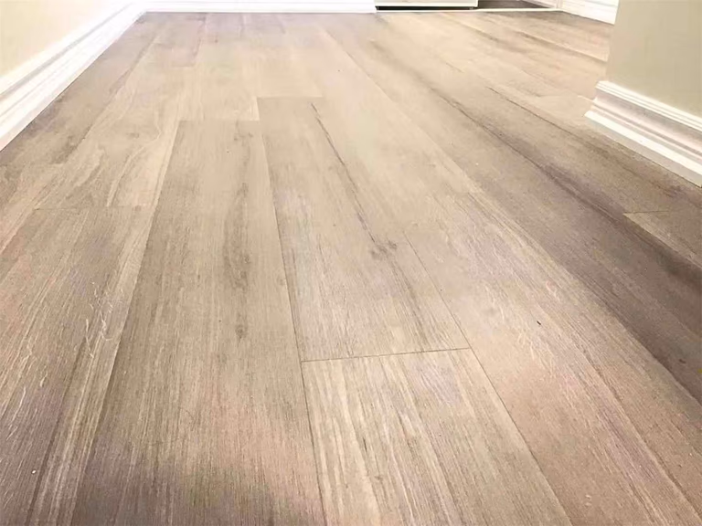 This Scarborough basement renovation features high-quality light wood-look flooring, creating a warm, clean, and modern living environment. The seamless installation enhances durability, moisture resistance, and overall aesthetic appeal, making it ideal for basement spaces. Completed by a professional Toronto Renovation Company, this project highlights both functionality and elegant design.