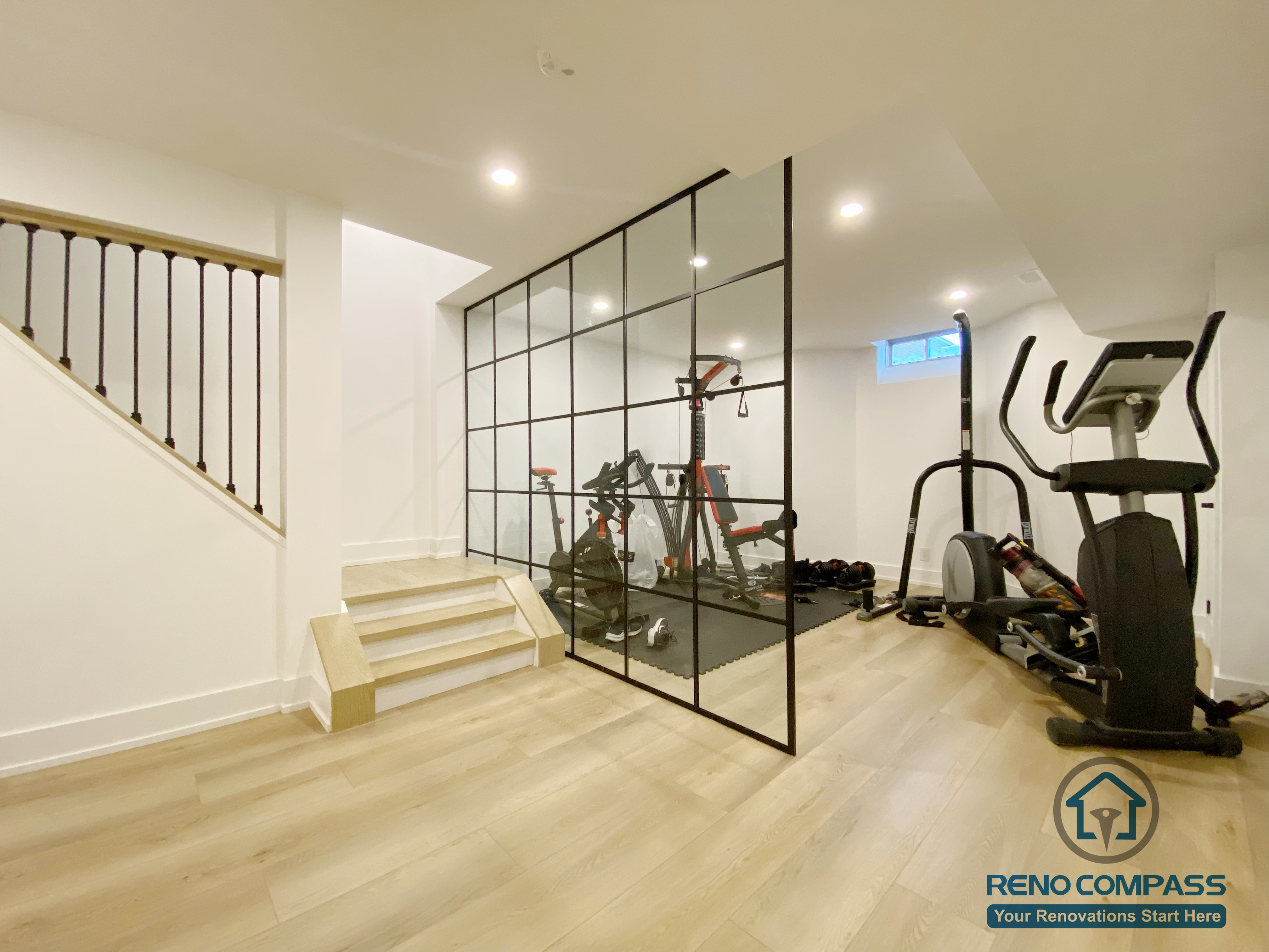 This basement gym room provides a dedicated home fitness space with a clean, modern design. Durable finishes and efficient lighting make it ideal for daily workouts as part of this Markham basement renovation.