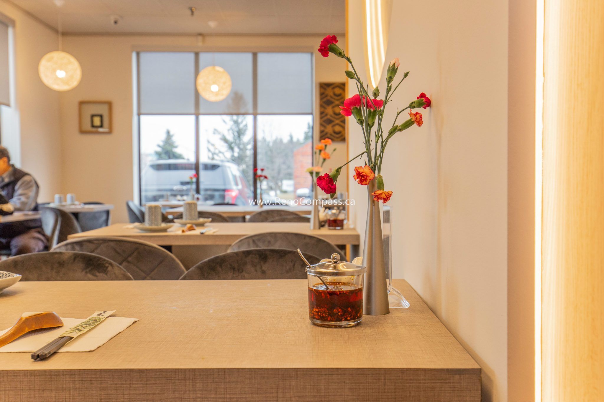 This Richmond Hill Chinese restaurant renovation by Toronto renovation company Reno Compass Inc. highlights refined dining table details and a warm, modern interior atmosphere. The upgraded space features custom dining tables, soft ambient lighting, elegant floral décor, and contemporary seating that enhance the overall customer experience. Designed to balance aesthetics and functionality, the renovation creates a welcoming and comfortable environment that elevates the restaurant’s brand image while supporting efficient daily operations.