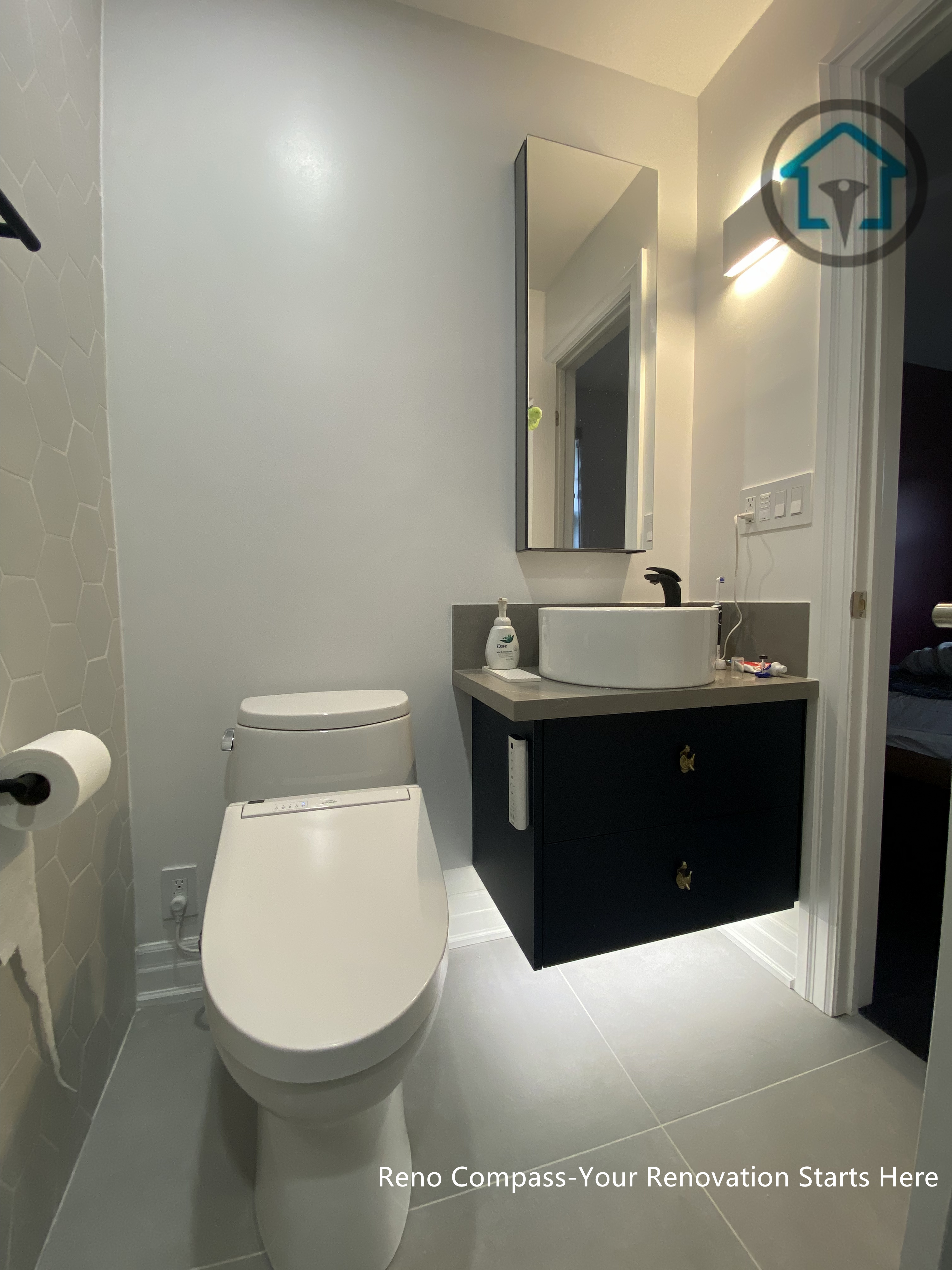 An alternate view highlighting coordinated finishes, wall-mounted accessories, and clean sightlines. The design focuses on practicality, clarity, and long-term usability.