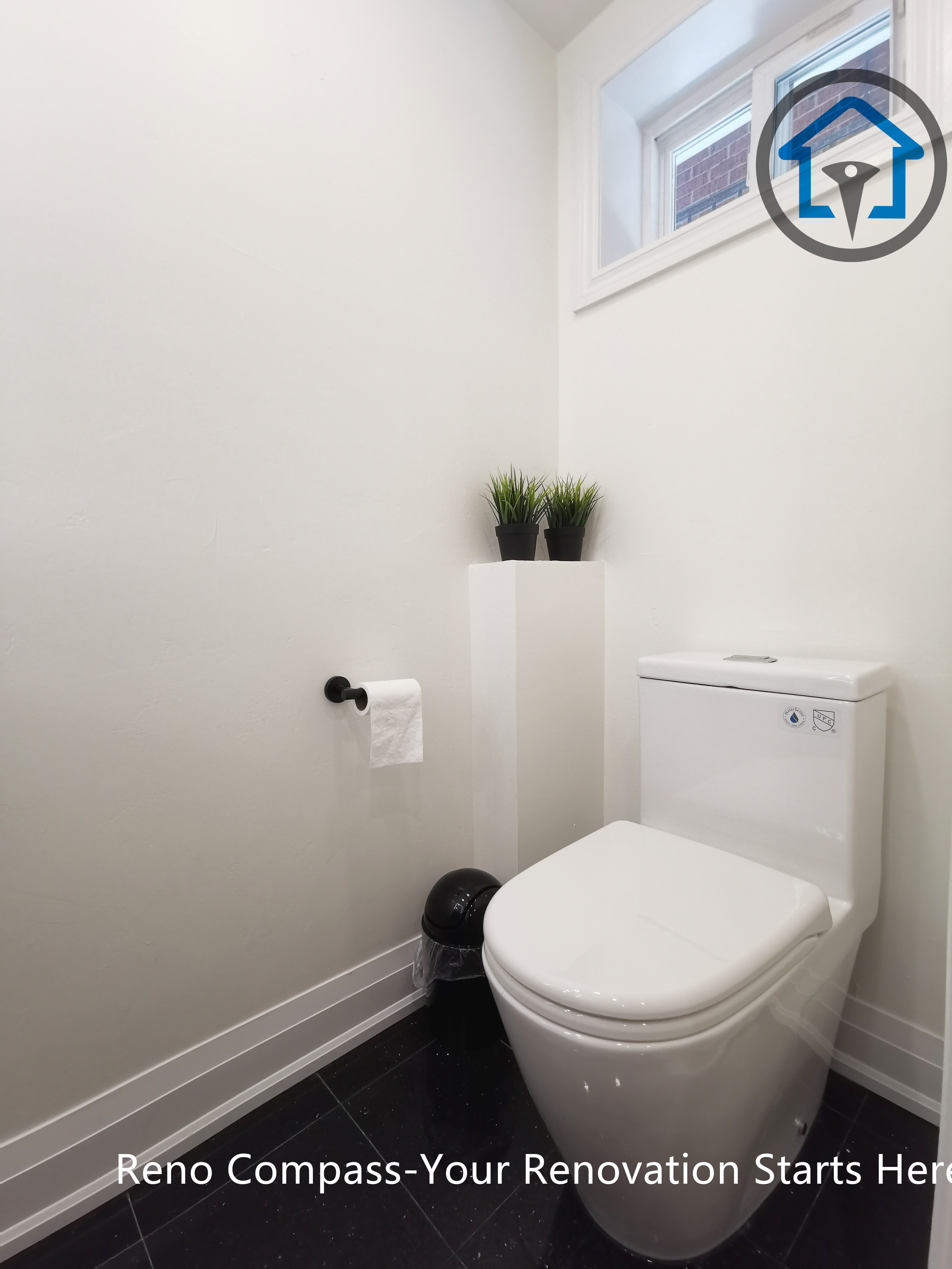 This North York basement renovation features a compact powder room designed with a modern toilet, matte black accessories, and a clean, minimalist layout. Light-colored walls and a small window help improve brightness and ventilation, creating a practical and comfortable basement bathroom completed by a Toronto renovation company focused on efficient space planning.