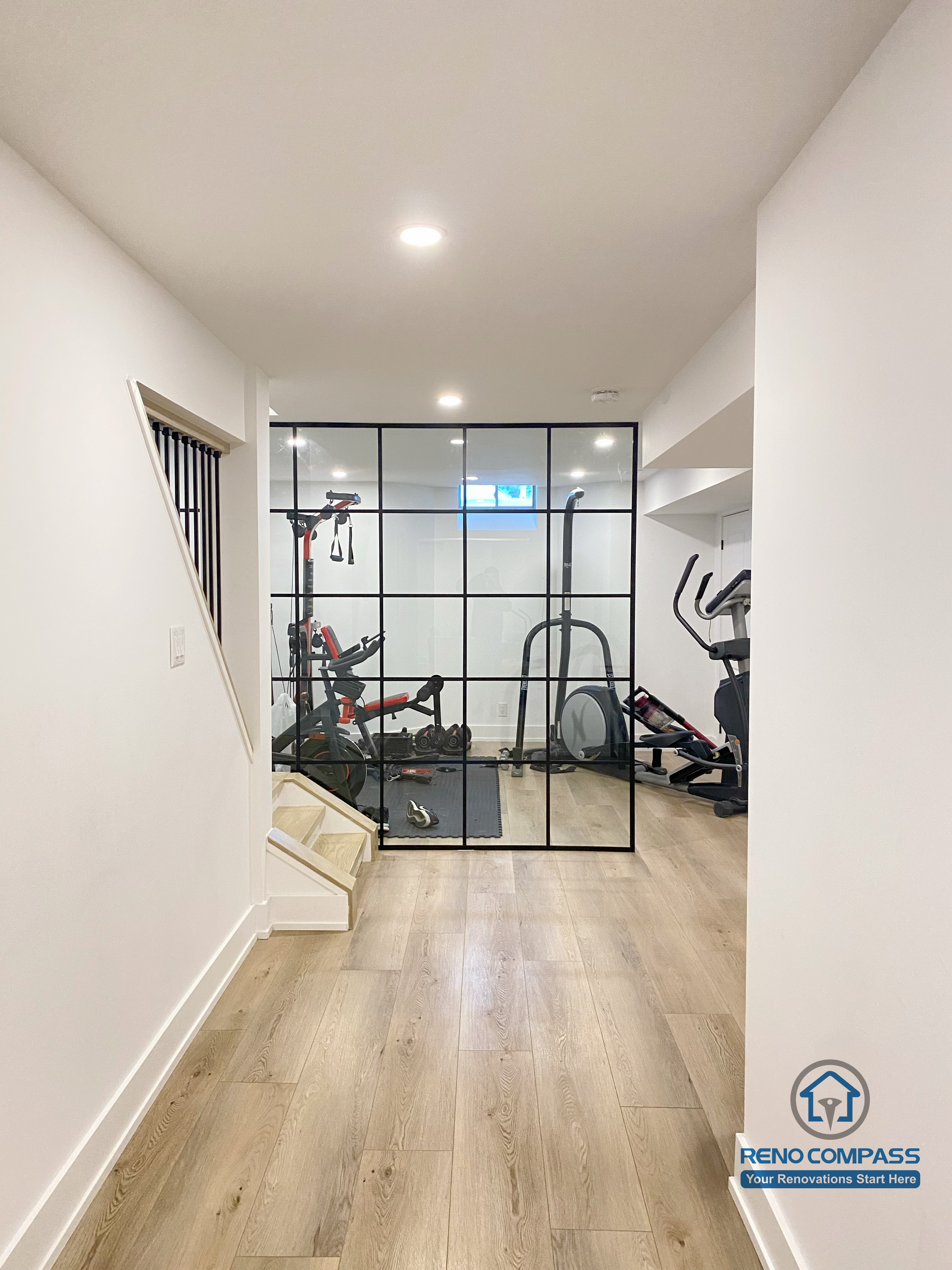 This basement gym room provides a dedicated home fitness space with a clean, modern design. Durable finishes and efficient lighting make it ideal for daily workouts as part of this Markham basement renovation.