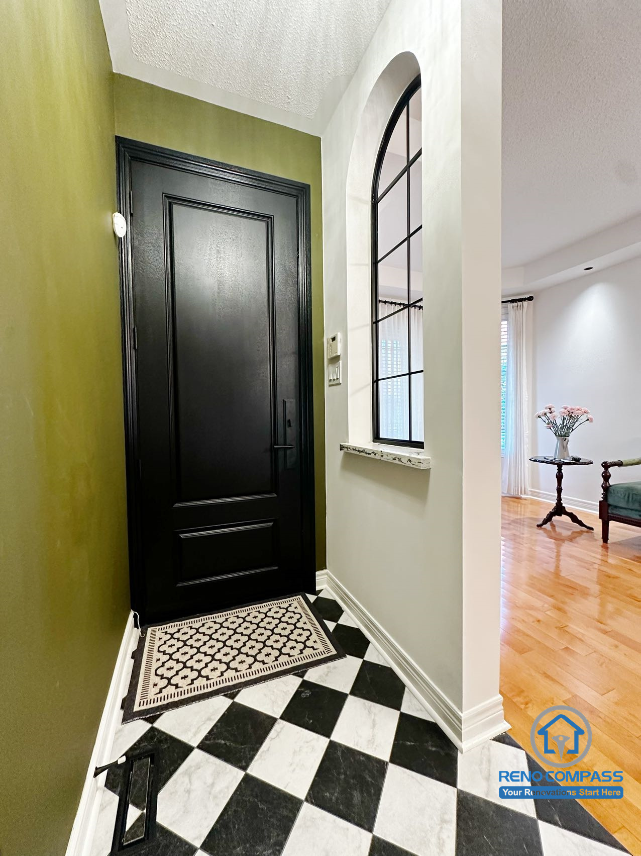 Interior entryway from a Markham renovation project, providing a clear and functional transition between the entrance and living area.