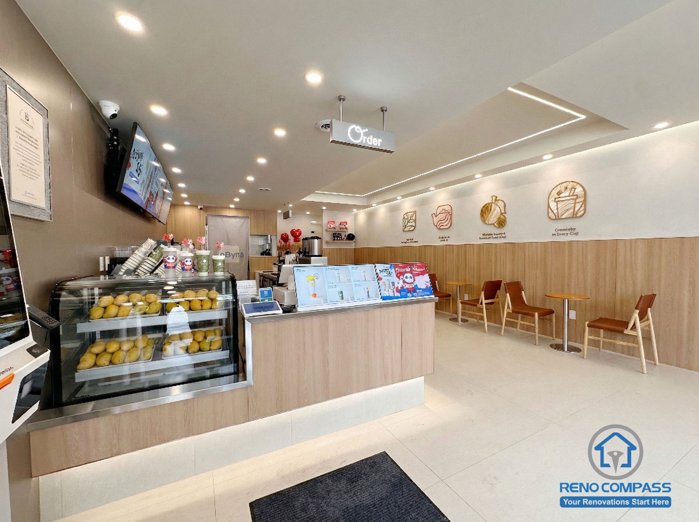 This North York bubble tea shop renovation features a modern service counter, digital menu display, and efficient ordering layout designed for high customer traffic. Completed by a professional Toronto renovation company, the commercial interior combines clean finishes, warm lighting, and functional workflow to enhance both customer experience and daily store operations.