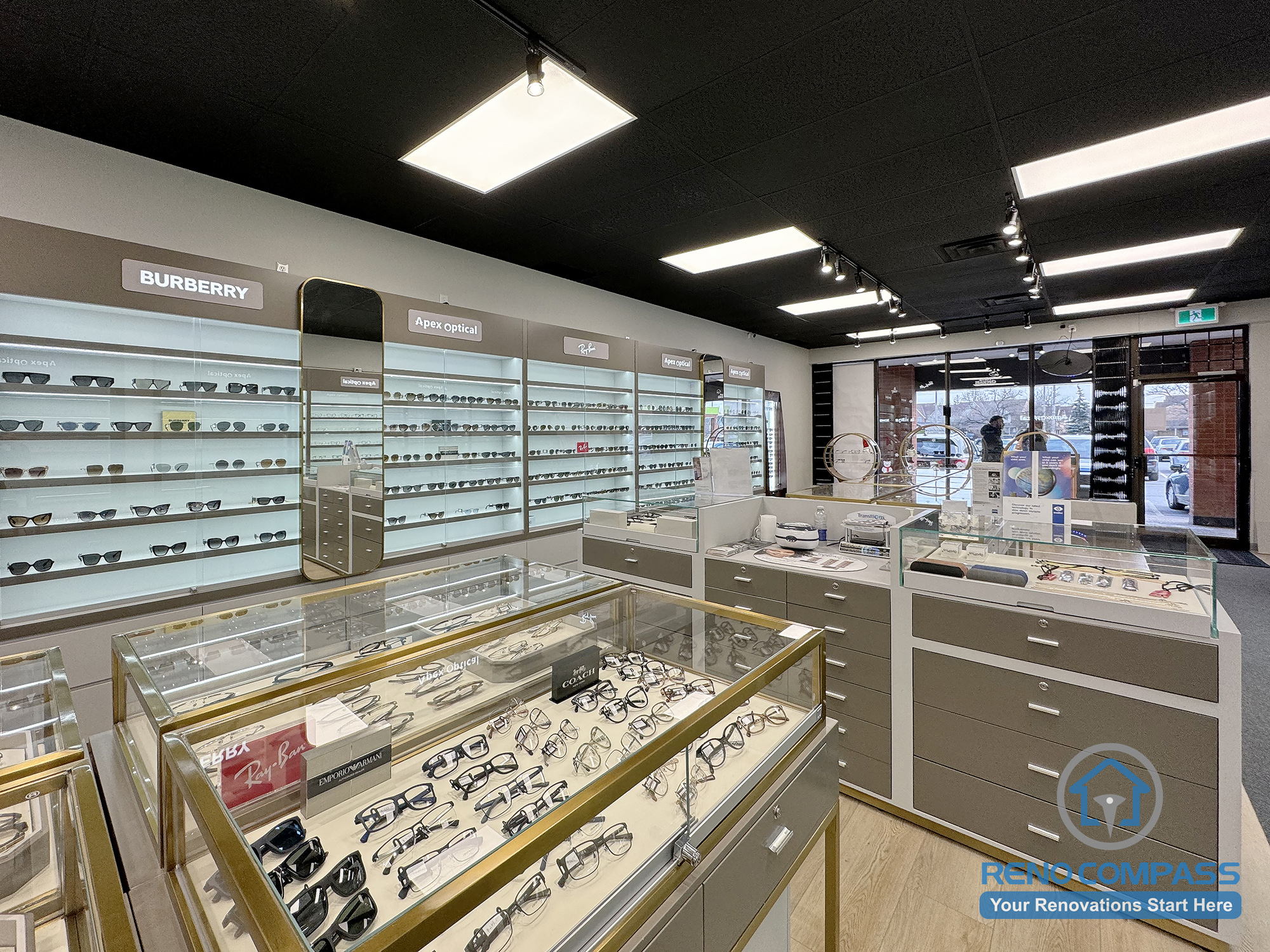 This Mississauga optical store renovation highlights custom-built eyewear display cases, integrated brand shelving, and a clean retail layout designed for premium optical brands. The space emphasizes product visibility, organized circulation, and a modern commercial interior suited for high-traffic eyewear retail.
