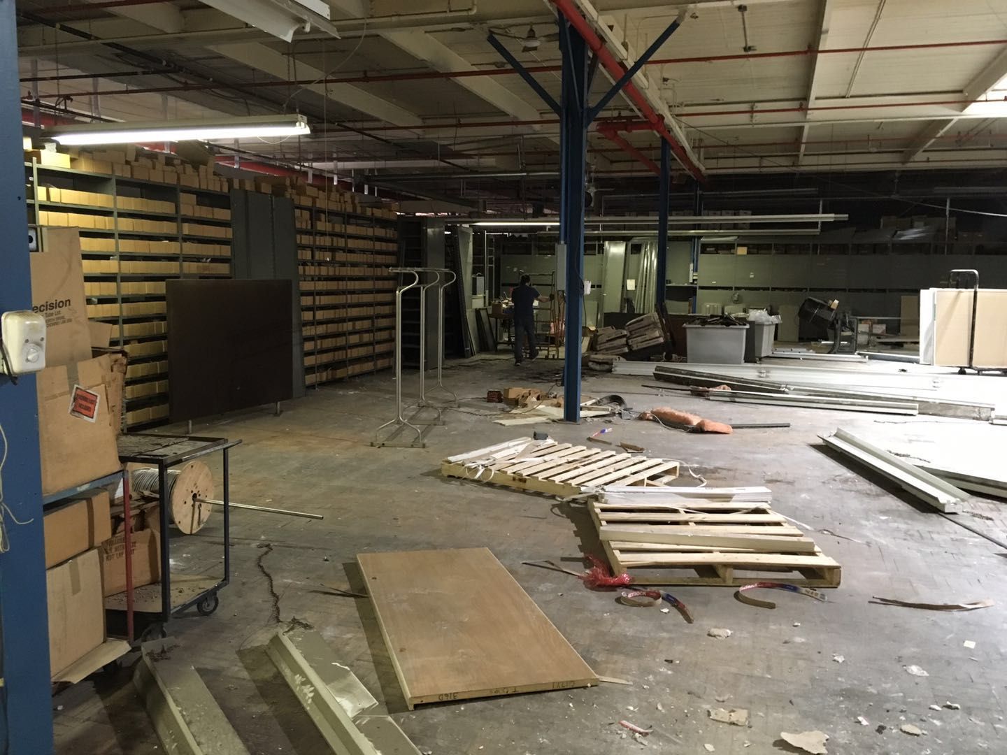 This Toronto factory renovation image captures an industrial space during active construction and interior transformation. The project includes demolition, structural adjustments, and layout reconfiguration to prepare for a more efficient production and storage environment. Reno Compass Inc., a trusted Toronto renovation company specializing in commercial and factory renovations, focuses on safe construction practices, durable materials, and optimized space planning to support modern industrial operations and long-term functionality.
