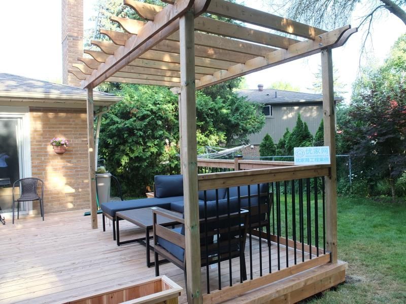 This Vaughan backyard deck project showcases a custom-built pressure-treated wood platform paired with a handcrafted pergola structure. The open-beam pergola design provides partial shade while maintaining airflow and natural light, creating a comfortable outdoor lounge environment.

The deck features black aluminum railings for safety and a modern contrast against the natural wood finish. With a spacious seating area and seamless transition from the home’s rear entrance, this deck enhances both functionality and visual appeal. Professionally constructed for durability, this outdoor upgrade significantly improves backyard usability and property value.